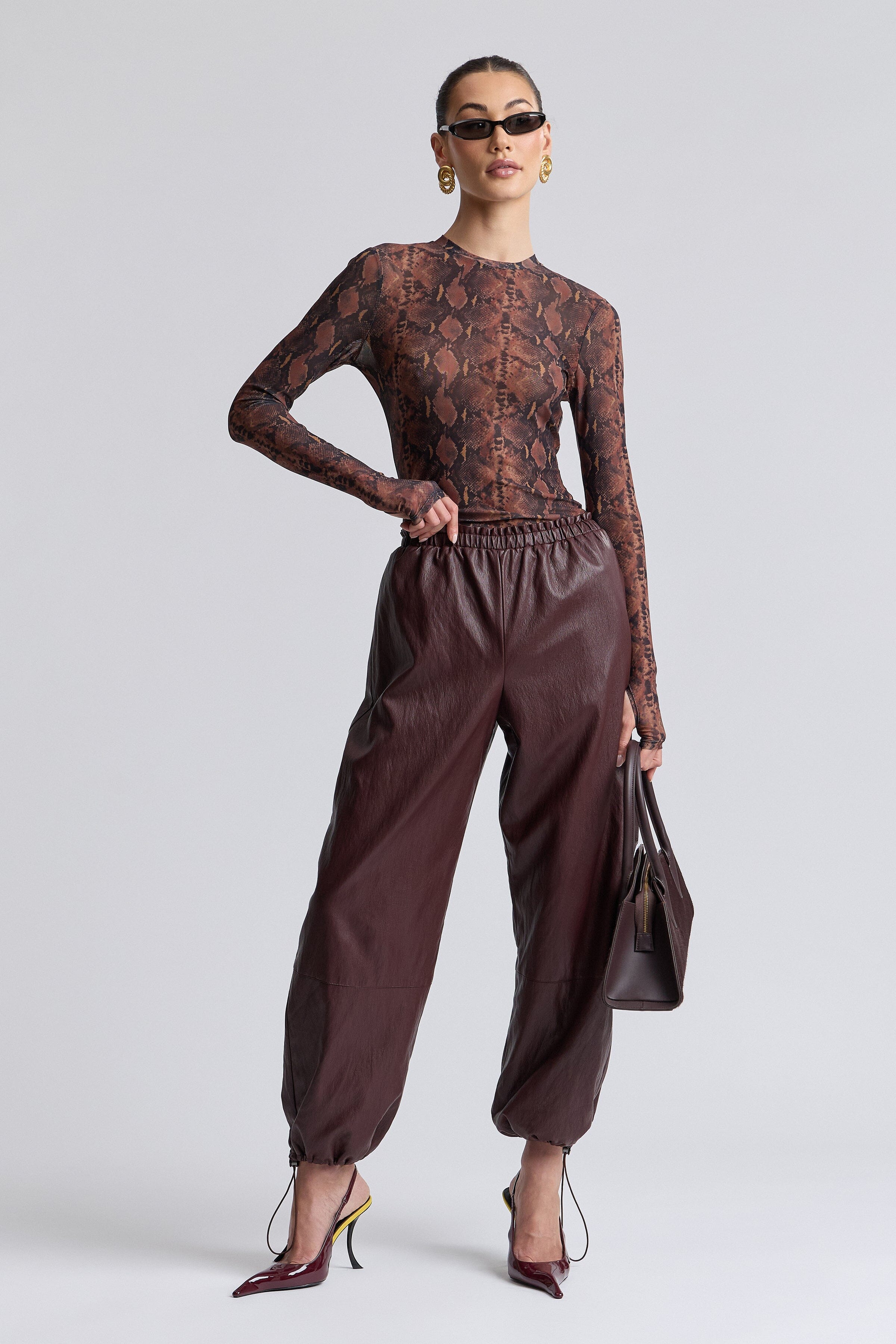 Stretch mesh long-sleeve thumbhole snake skin top with crew neck - Shop women's printed tops by Avec Les Filles.