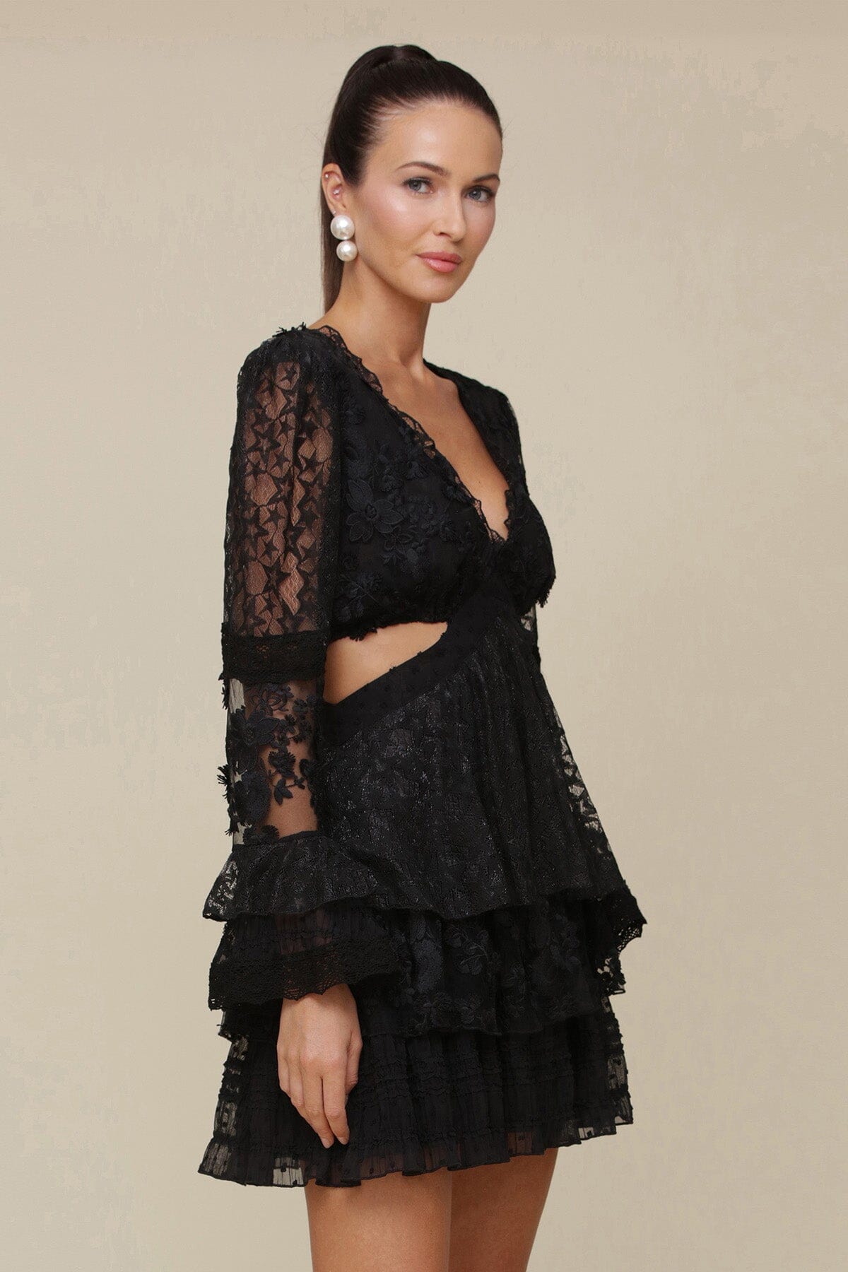 Black Tiered Lace Cut-Out Mini Dress with long sleeve, intricate lace panels, side cutouts and tiered cuffs and skirt - Cute women's dresses by Avec Les Filles