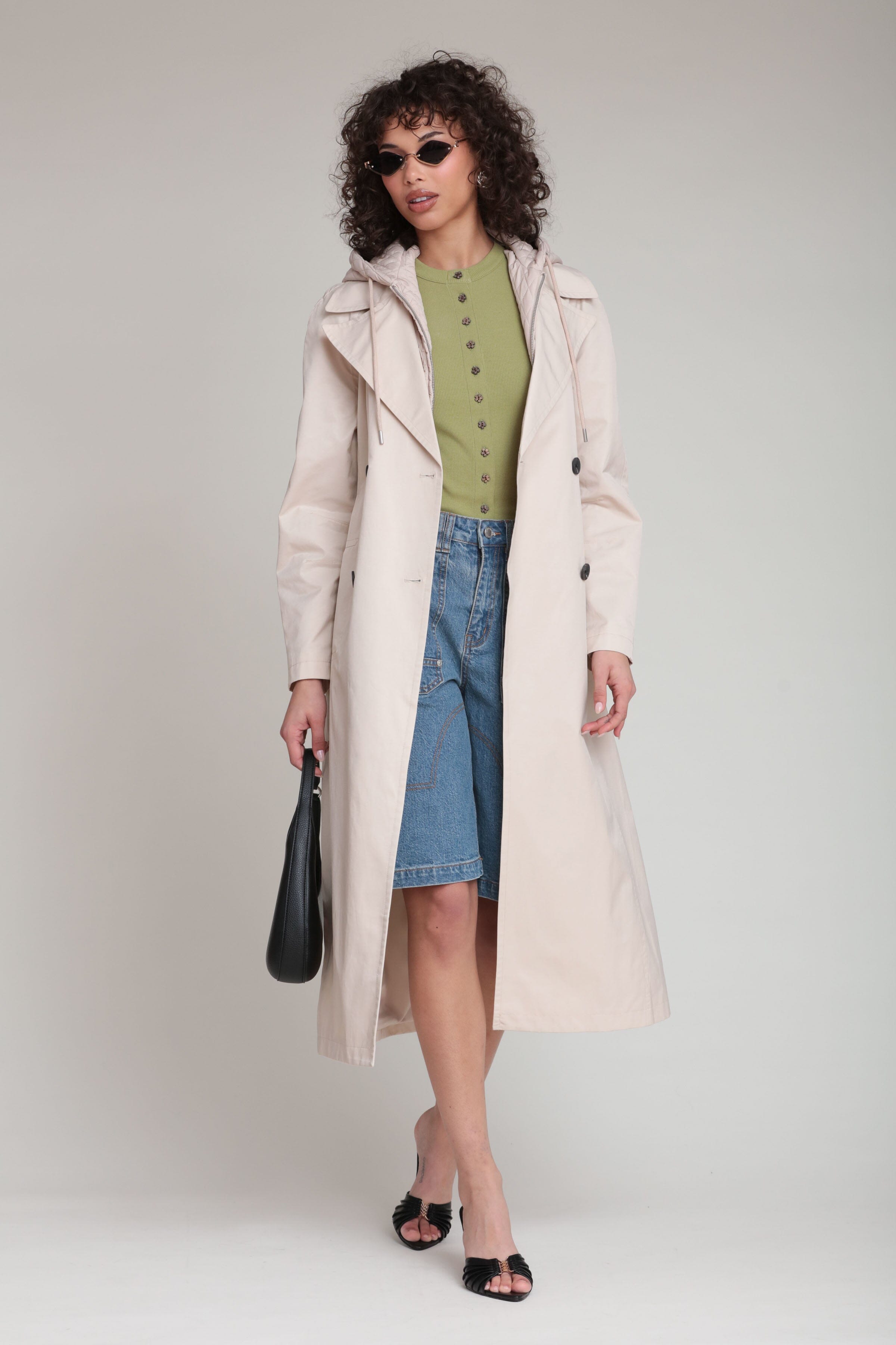Cotton nylon double-breasted front ivory midi trench coat with detachable quilted hooded and waist self-tie belt by Avec Les Filles