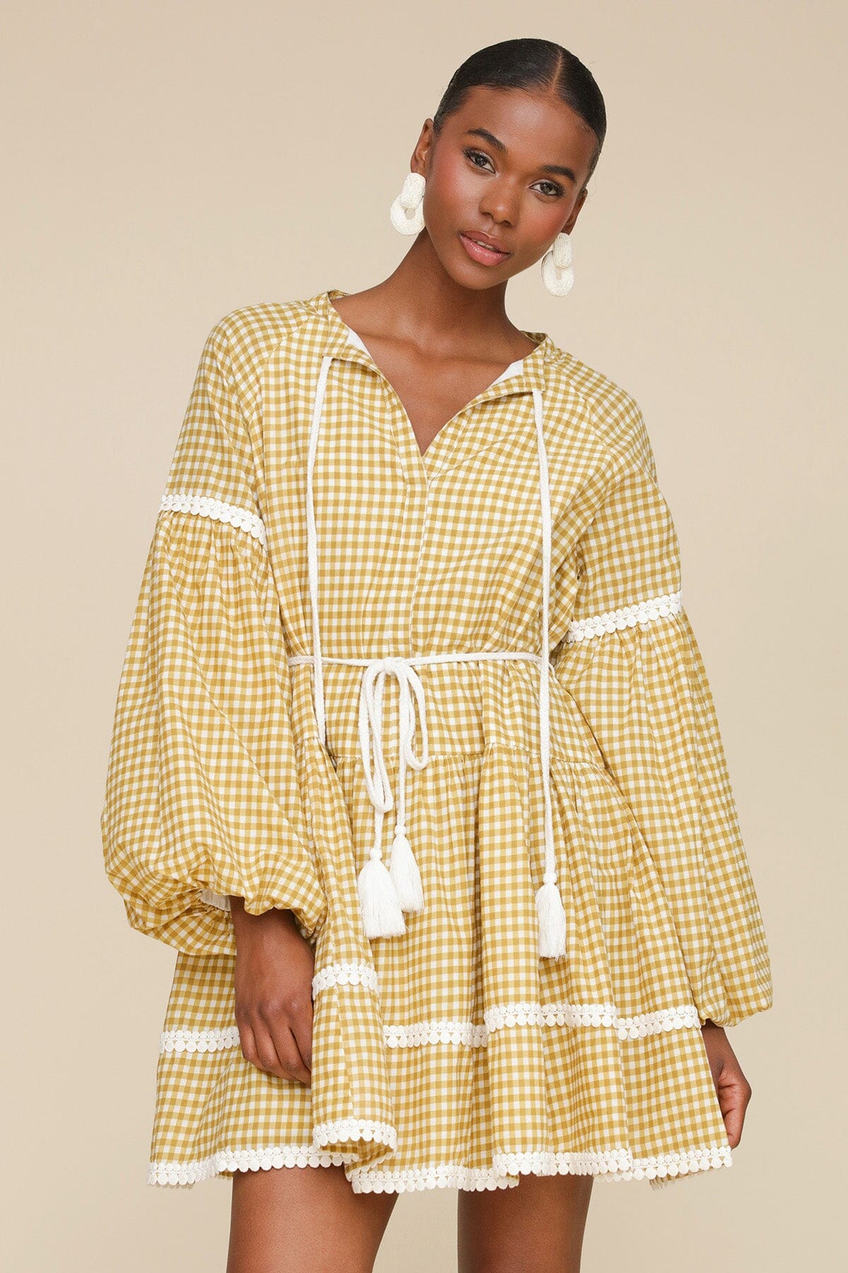 Olio gingham printed cotton prairie mini dress with round neckline, long balloon sleeves and removable self-tie belt by Avec Les Filles