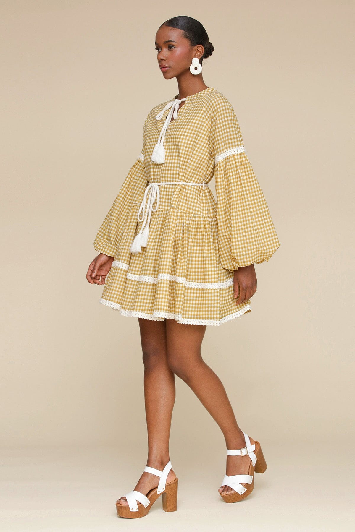 Olio gingham printed cotton prairie mini dress with round neckline, long balloon sleeves and removable self-tie belt by Avec Les Filles