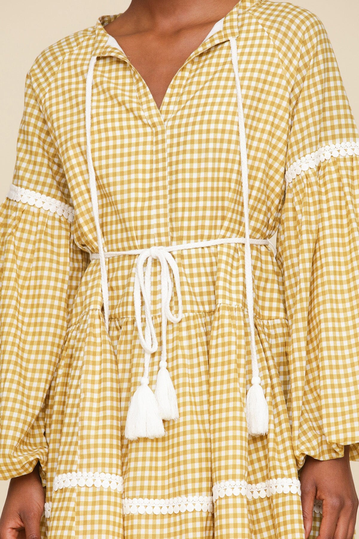 Olio gingham printed cotton prairie mini dress with round neckline, long balloon sleeves and removable self-tie belt by Avec Les Filles