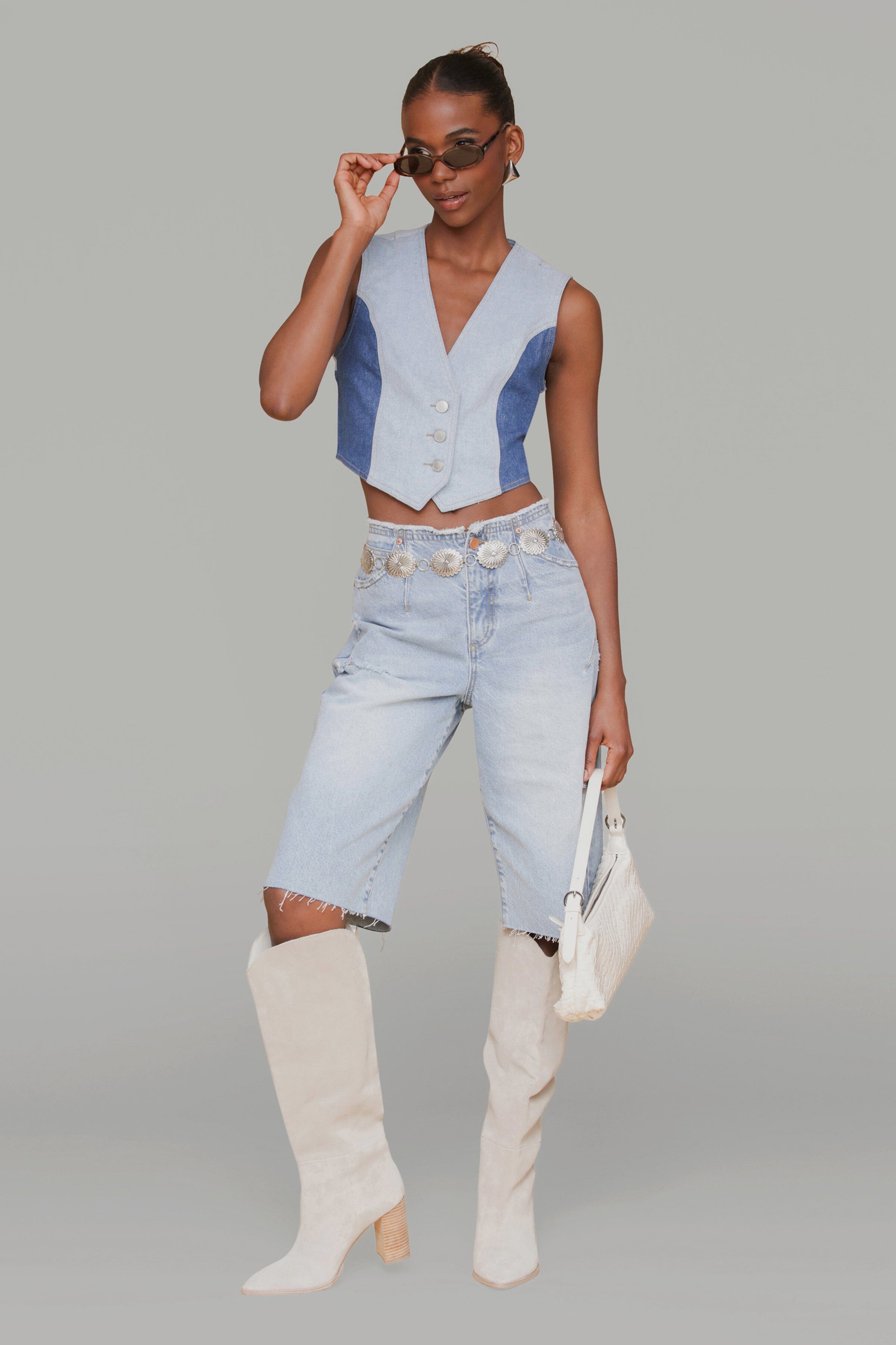 Two-tone light blue sleeveless denim vest with V-neck and button front - Shop women's denim vests by Avec Les Filles