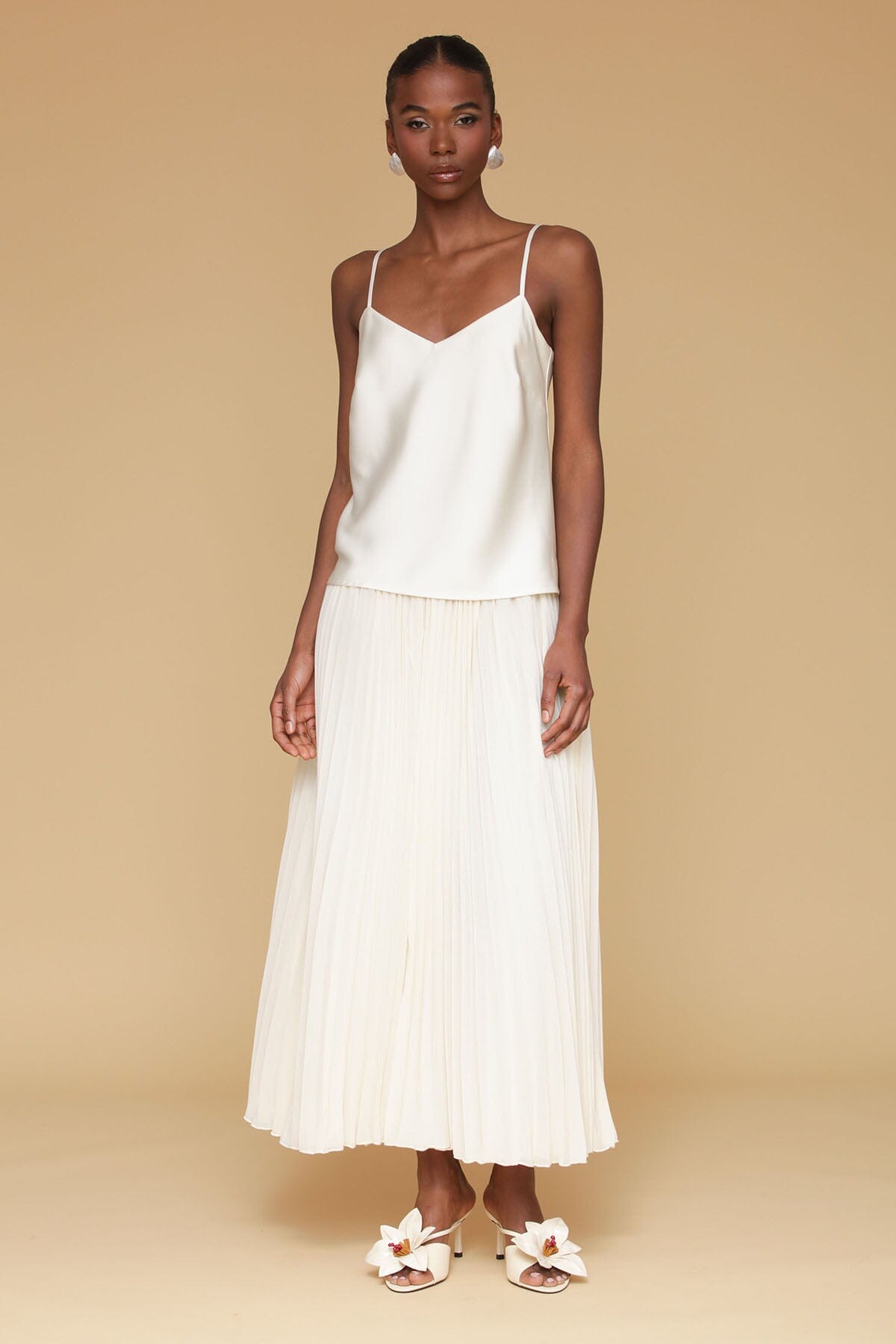 Cream satin drop-waist pleated maxi dress with adjustable spaghetti straps and v-neckline - Cute women's maxi dresses by Avec Les Filles