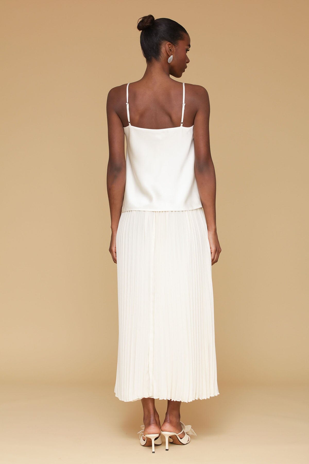 Cream satin drop-waist pleated maxi dress with adjustable spaghetti straps and v-neckline - Cute women's maxi dresses by Avec Les Filles