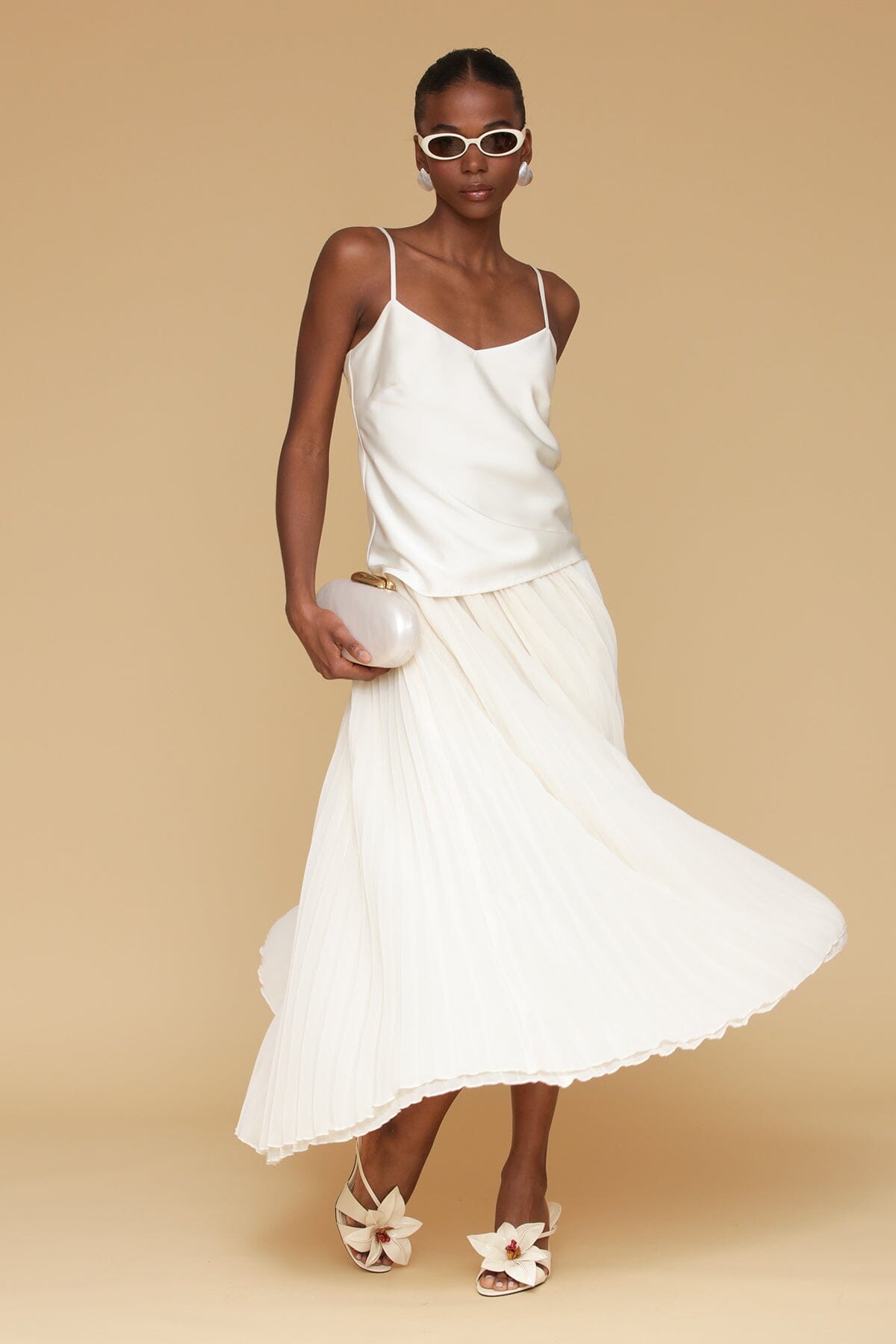 Cream satin drop-waist pleated maxi dress with adjustable spaghetti straps and v-neckline - Cute women's maxi dresses by Avec Les Filles