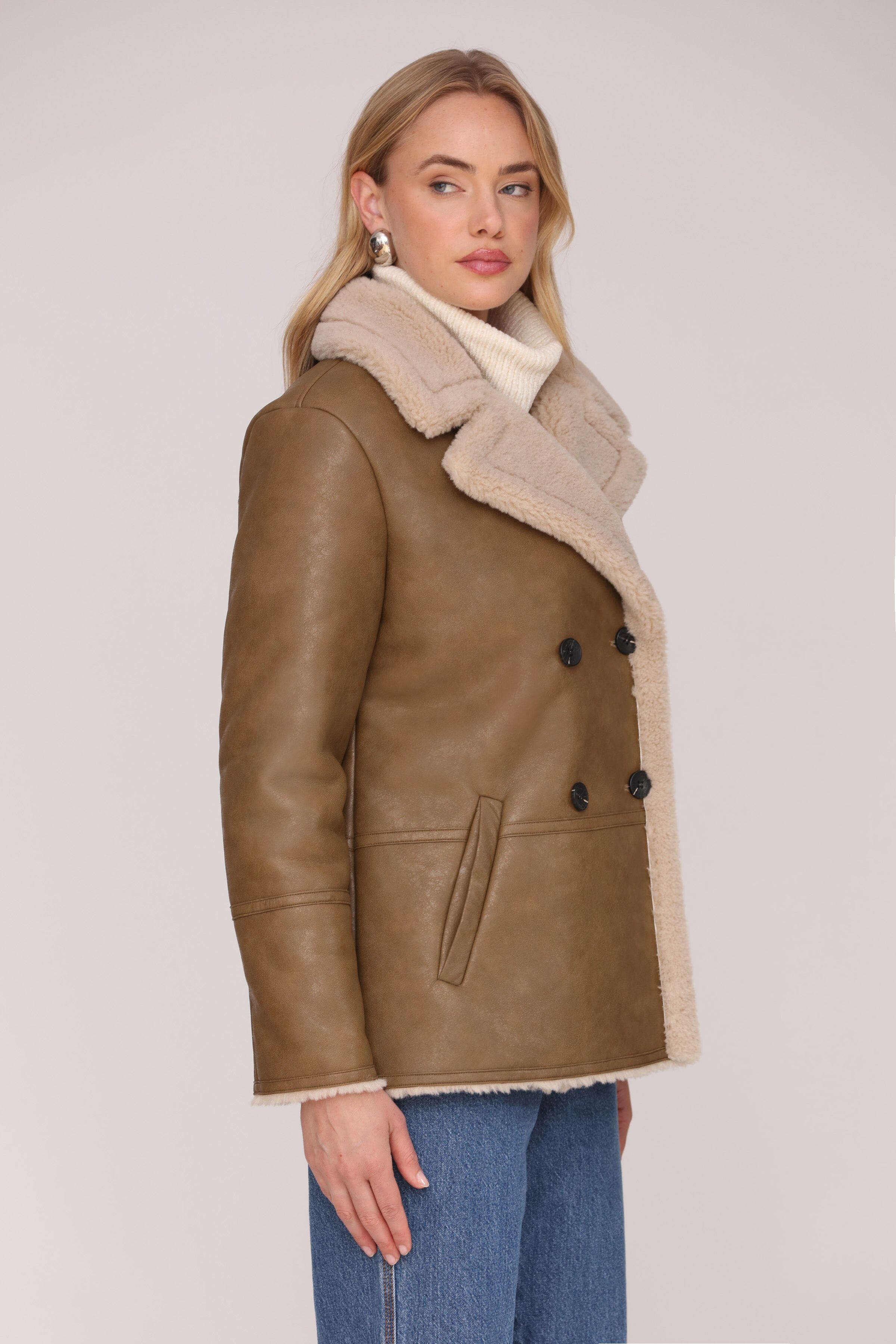 Brown and cream faux leather shearling double-breasted coat with an oversized notched collar and welt pockets - Shop cute women’s coats by Avec Les Filles