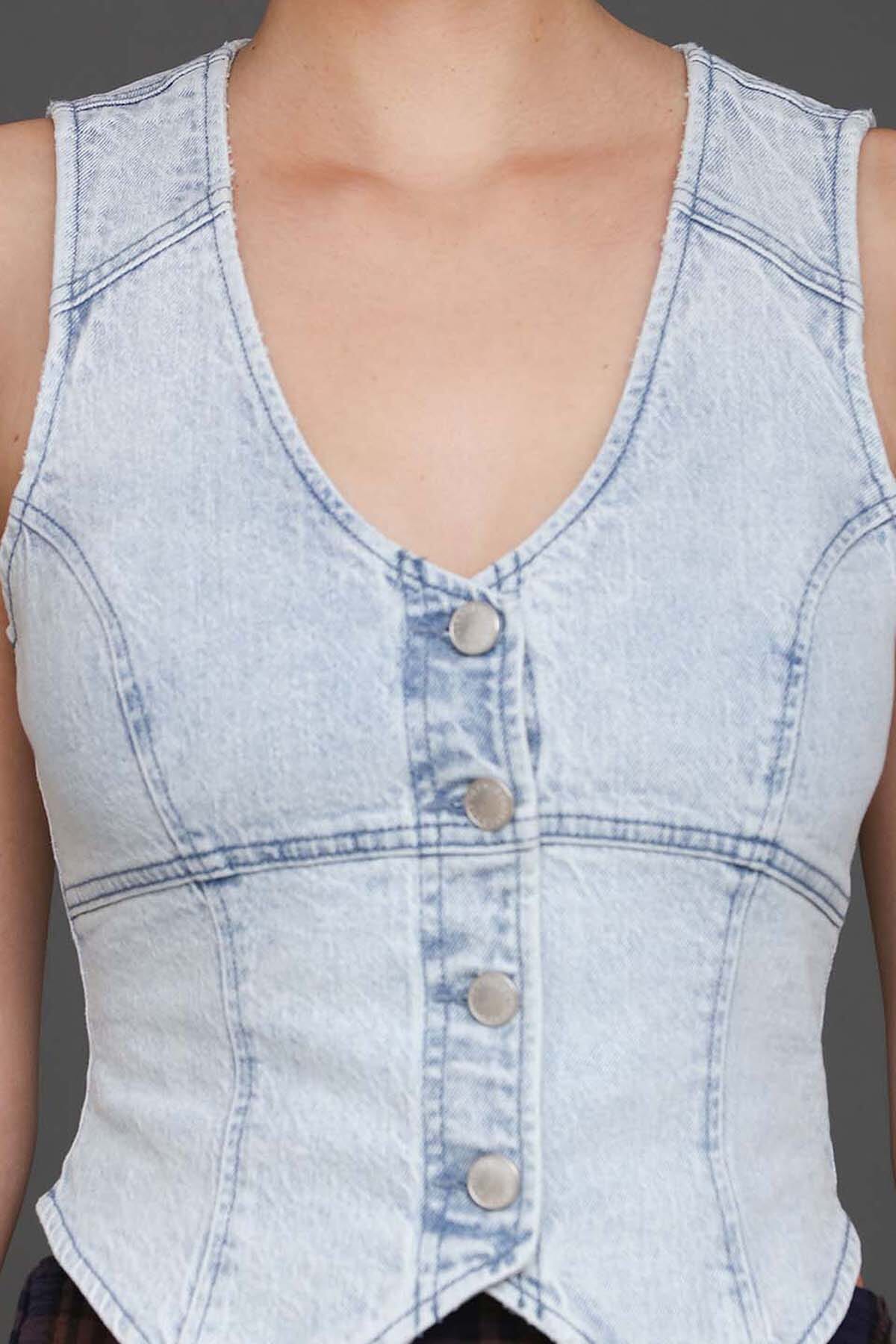 Light blue cotton blend denim corset vest top with V-neckline, sleeveless and button-front closure - Cute women's vest tops by Avec Les Filles
