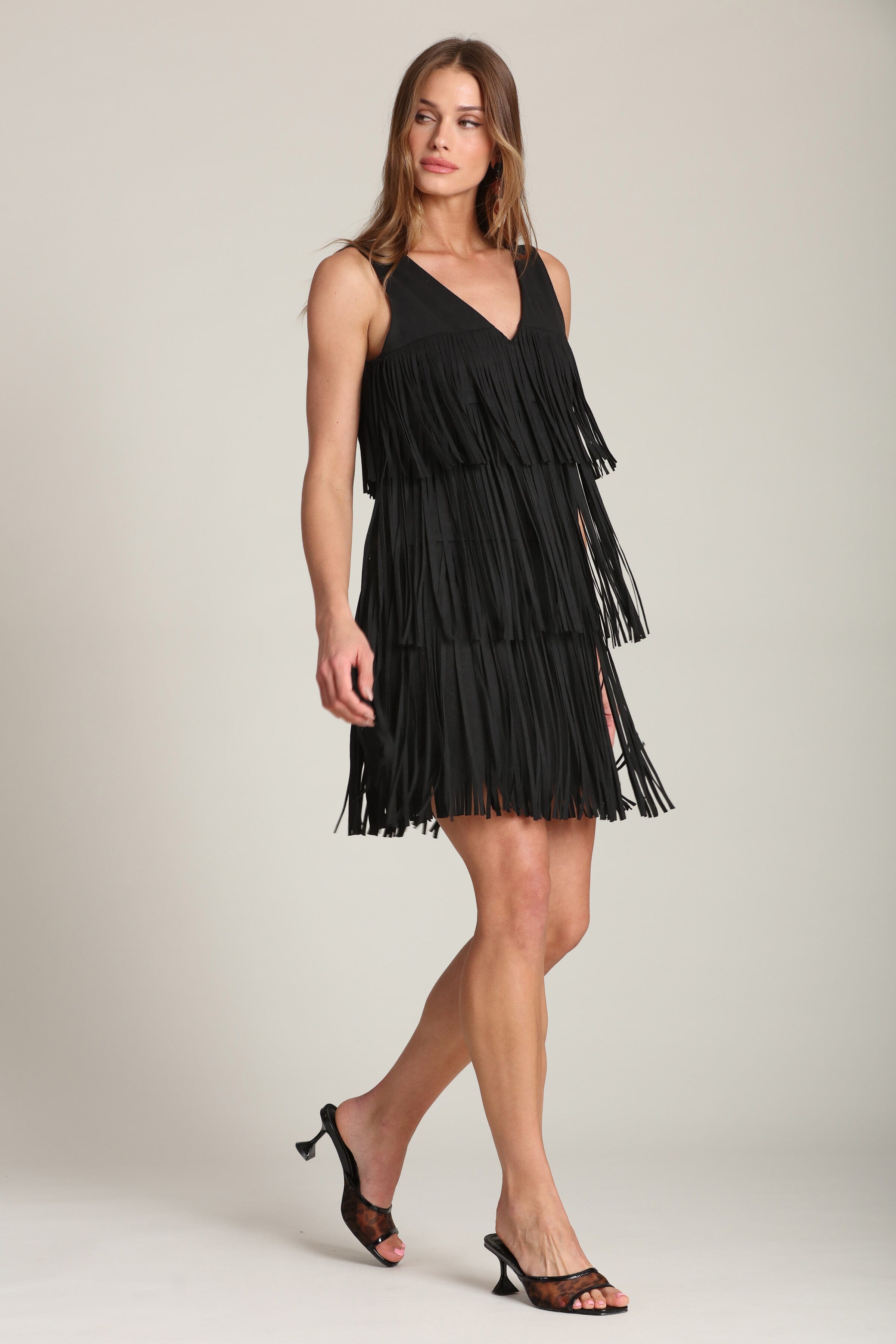Faux suede tiered fringe black shift mini dress with a V-neck - Shop cute designer women’s mini dresses by Avec Les Filles. Perfect for any day-to-night party