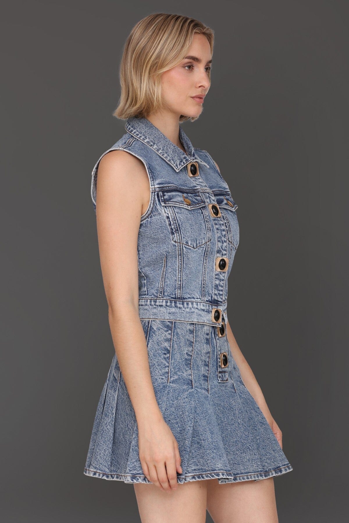 Novelty button-front blue denim vest top made from cotton-blend with a point collar
and chest flap pockets - Cute women's vest tops by Avec Les Filles