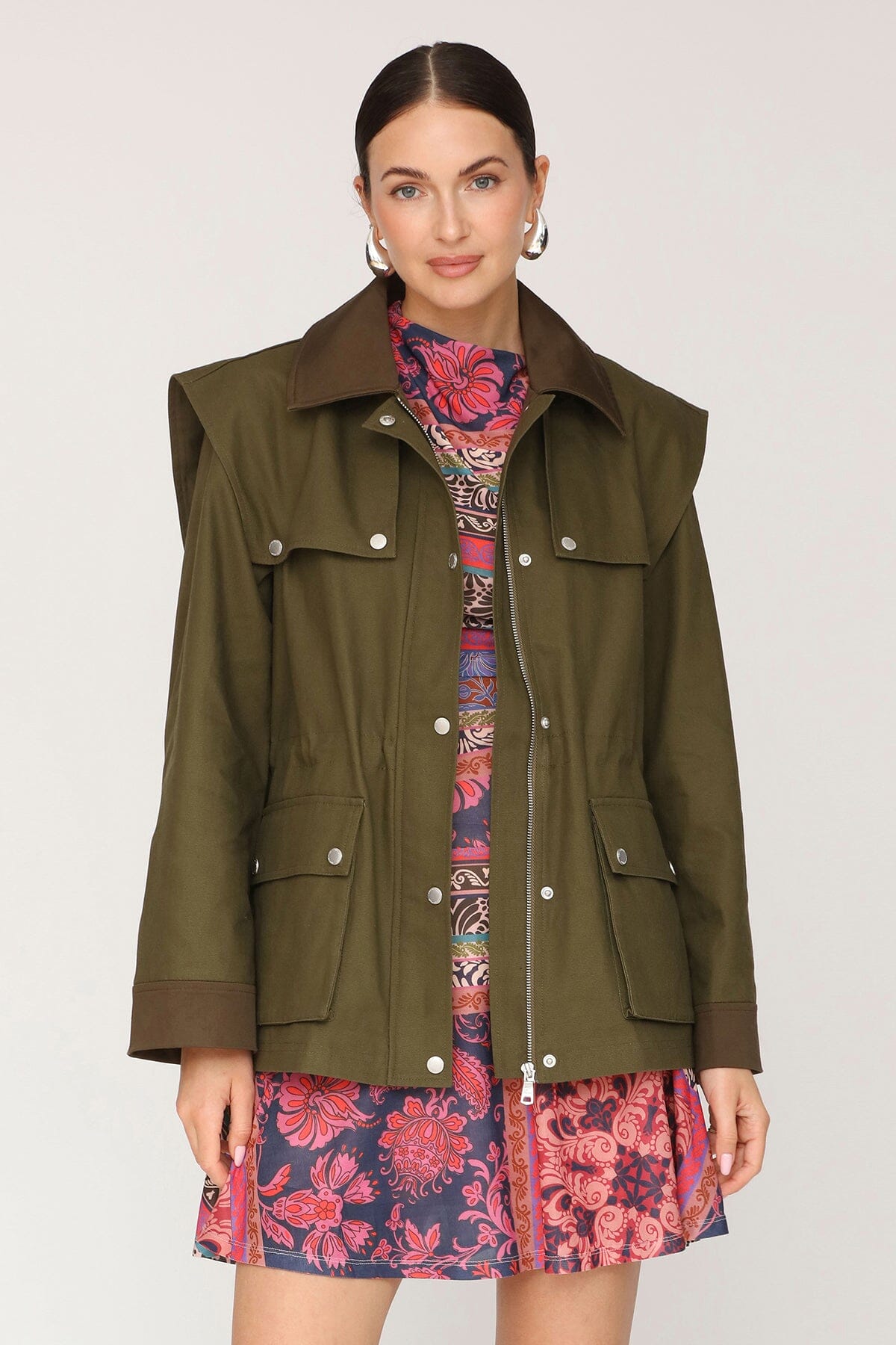 Strong shoulder cotton utility snap-front green jacket with a contrast collar and detachable storm flap - Cute women's jackets by Avec Les Filles