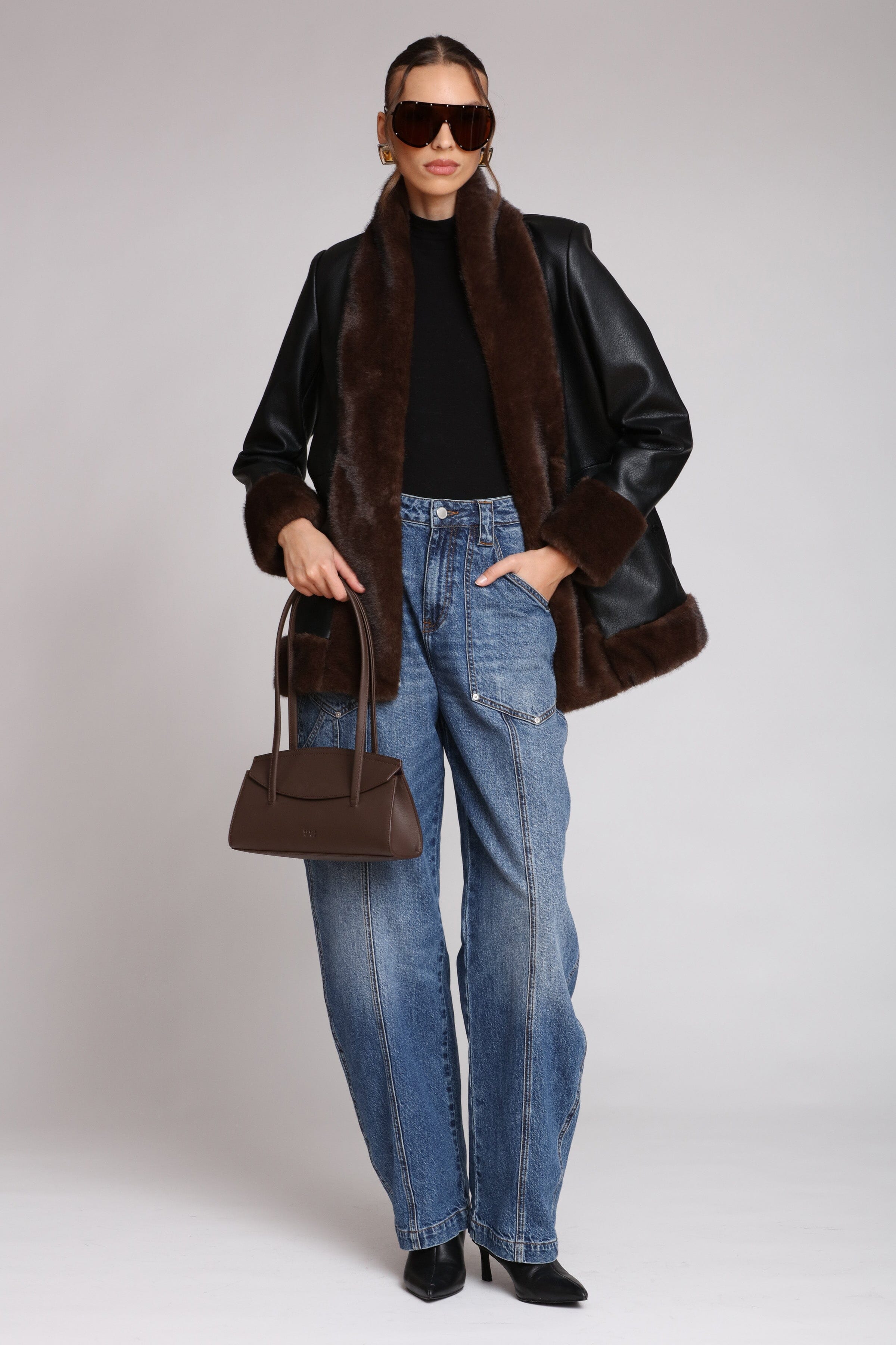 Brown fur-trimmed faux leather black jacket with open-front design, hook-and-eye closure, and side welt pockets - Shop designer women’s jackets by Avec Les Filles
