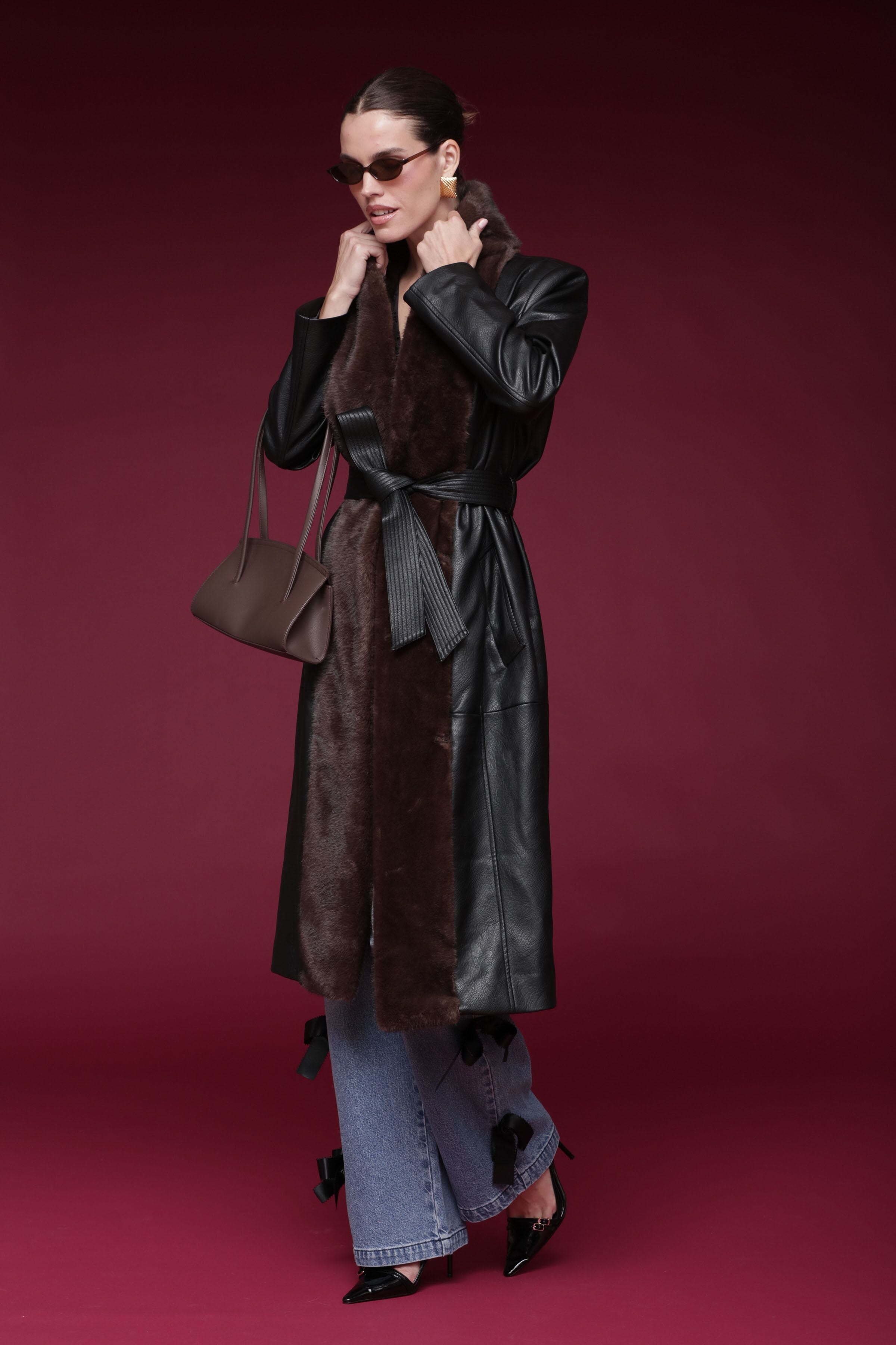Fur-trimmed faux leather black wrap coat with a wide faux fur shawl collar, self-tie belt, and side pockets - Shop designer long wrap coats by Avec Les Filles