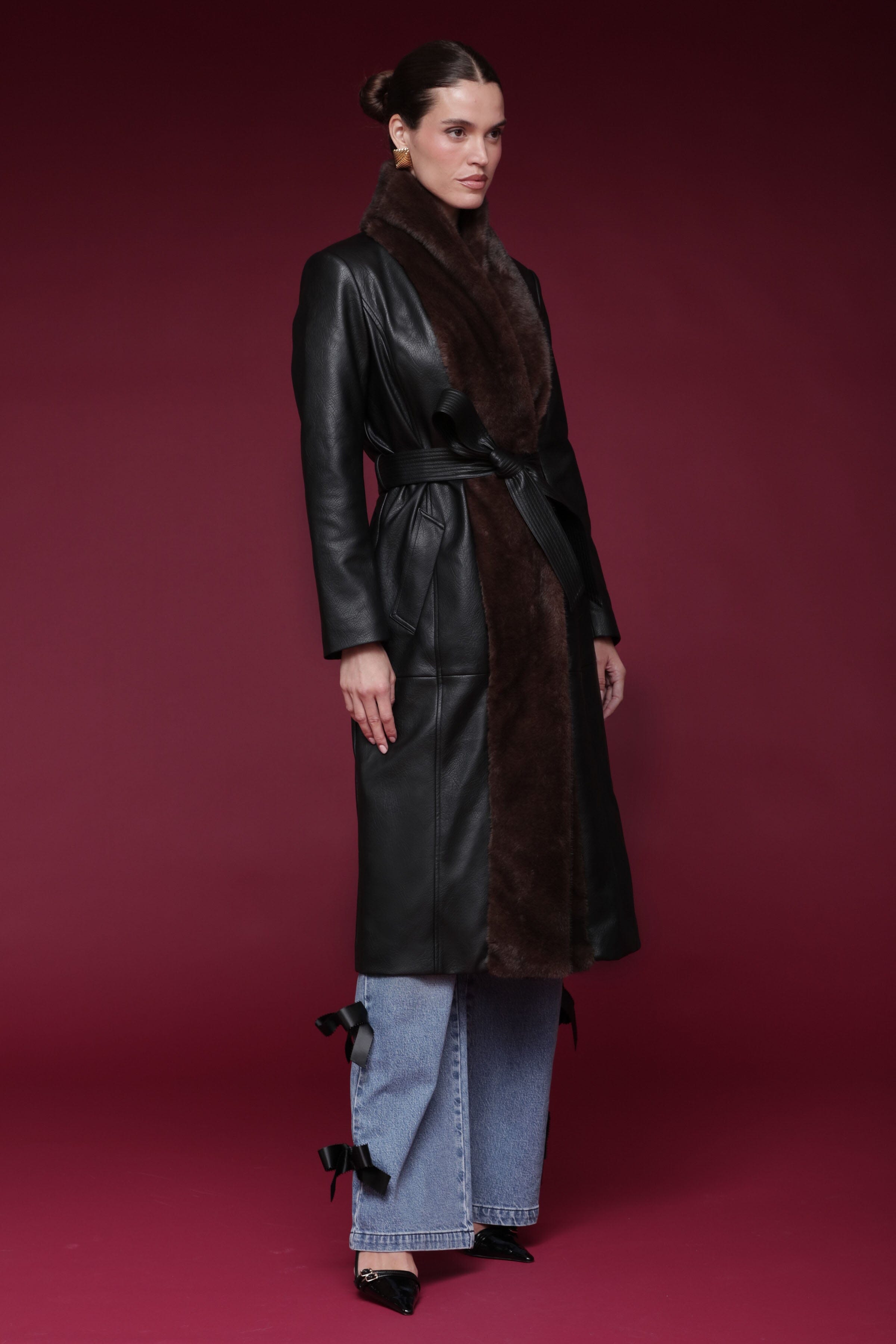 Fur-trimmed faux leather black wrap coat with a wide faux fur shawl collar, self-tie belt, and side pockets - Shop designer long wrap coats by Avec Les Filles