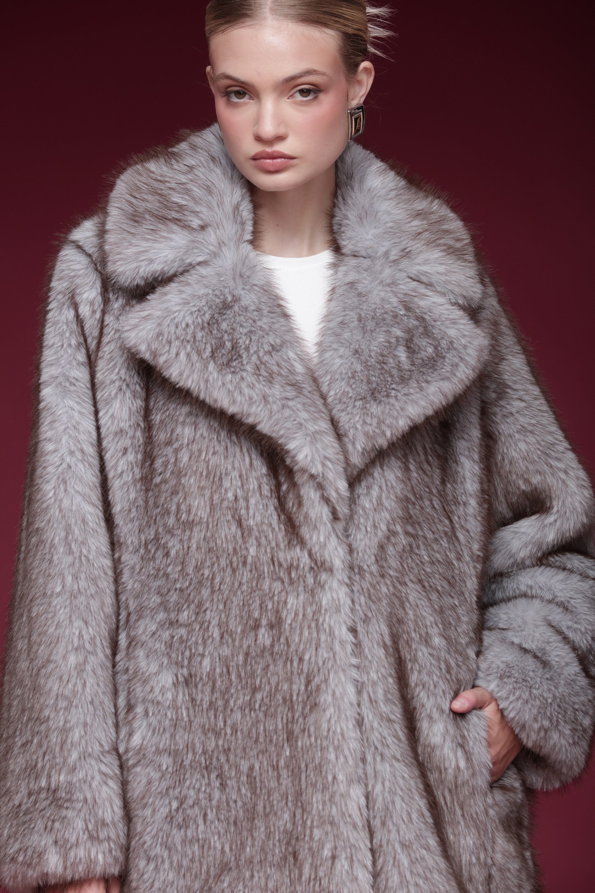 Grey faux fur maxi coat with a wide notched collar, hook-and-eye closure, and side pockets - Shop designer women’s long maxi coats by Avec Les Filles