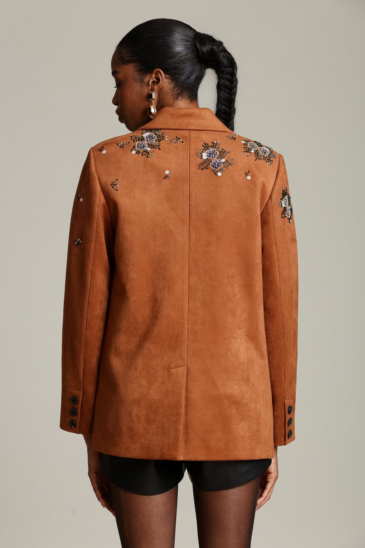 Embellished faux suede double-breasted button front brown blazer jacket with notched collar and flap pockets. Shop cute women's blazers by Avec Les Filles.