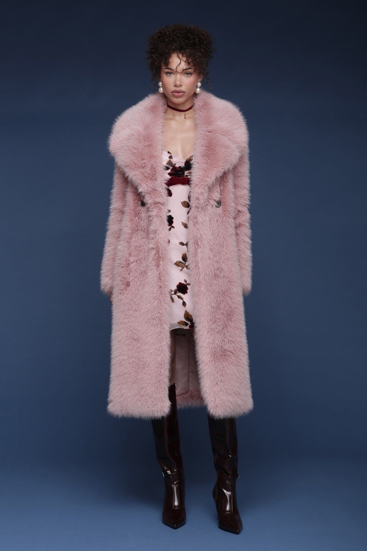 Oversized faux fur double-breasted pink midi coat with a wide notched lapel collar and side welt pockets - Shop designer women’s midi coats by Avec Les Filles.