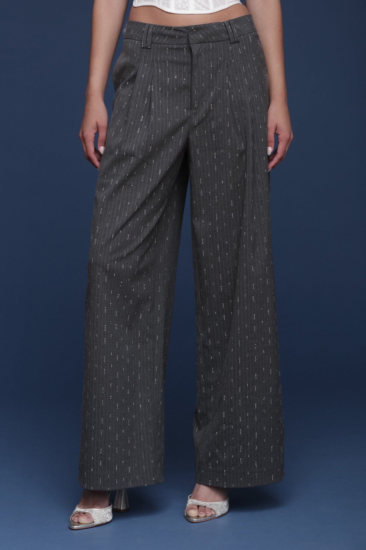 Crystal grey pinstripe wide-leg trouser with front pleats for a tailored structure and flap pockets - Shop designer women's trousers pants by Avec Les Filles