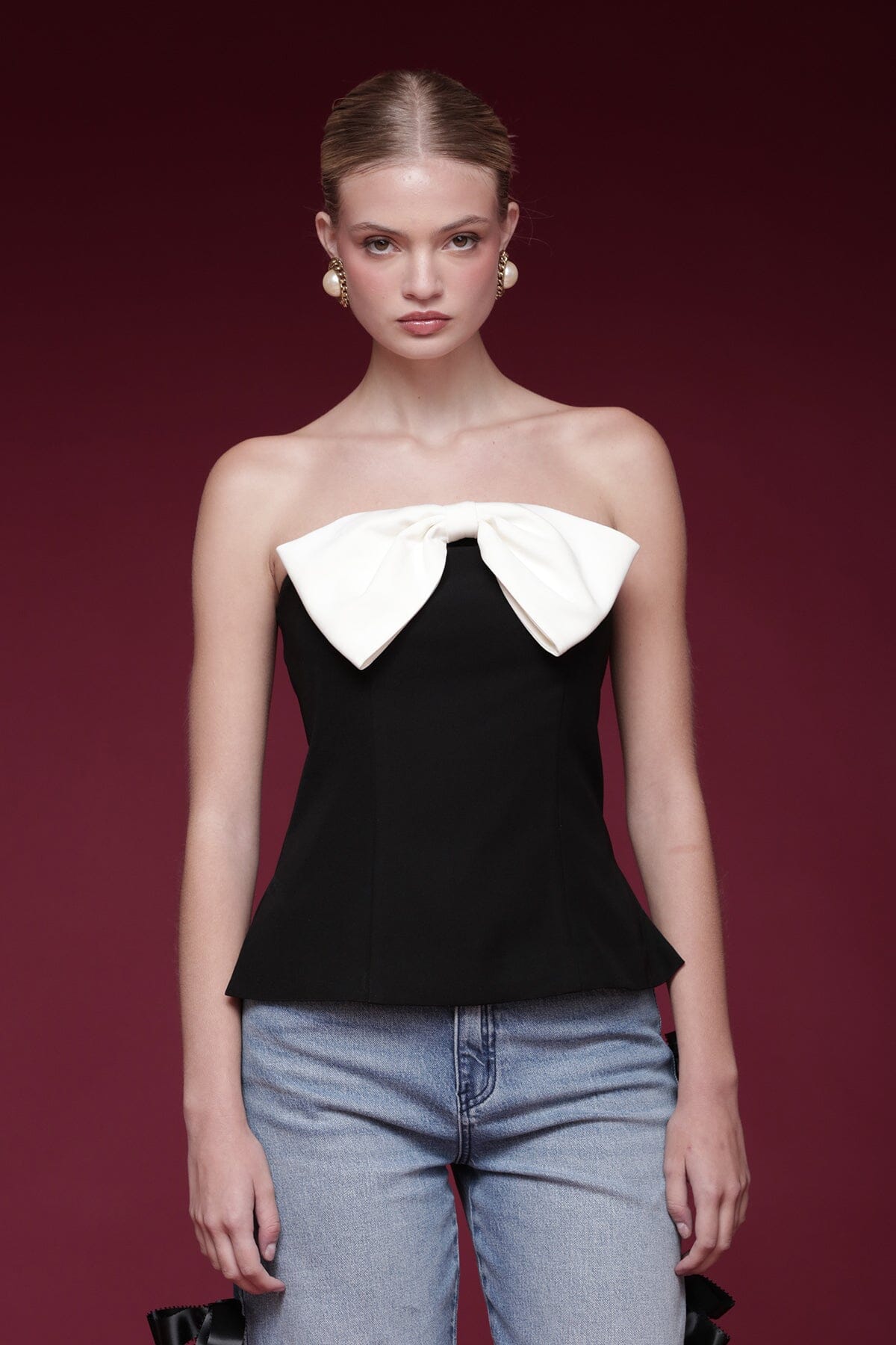 Bow embellished black and white tube top with strapless neckline and fitted bodice - Shop designer women's tube tops by Avec Les Filles