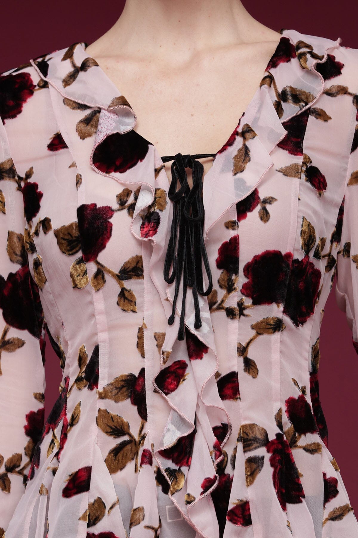 Floral velvet ruffle-front pink blouse with sheer long sleeves, V-neckline, and peplum hem - Shop designer women's tops by Avec Les Filles