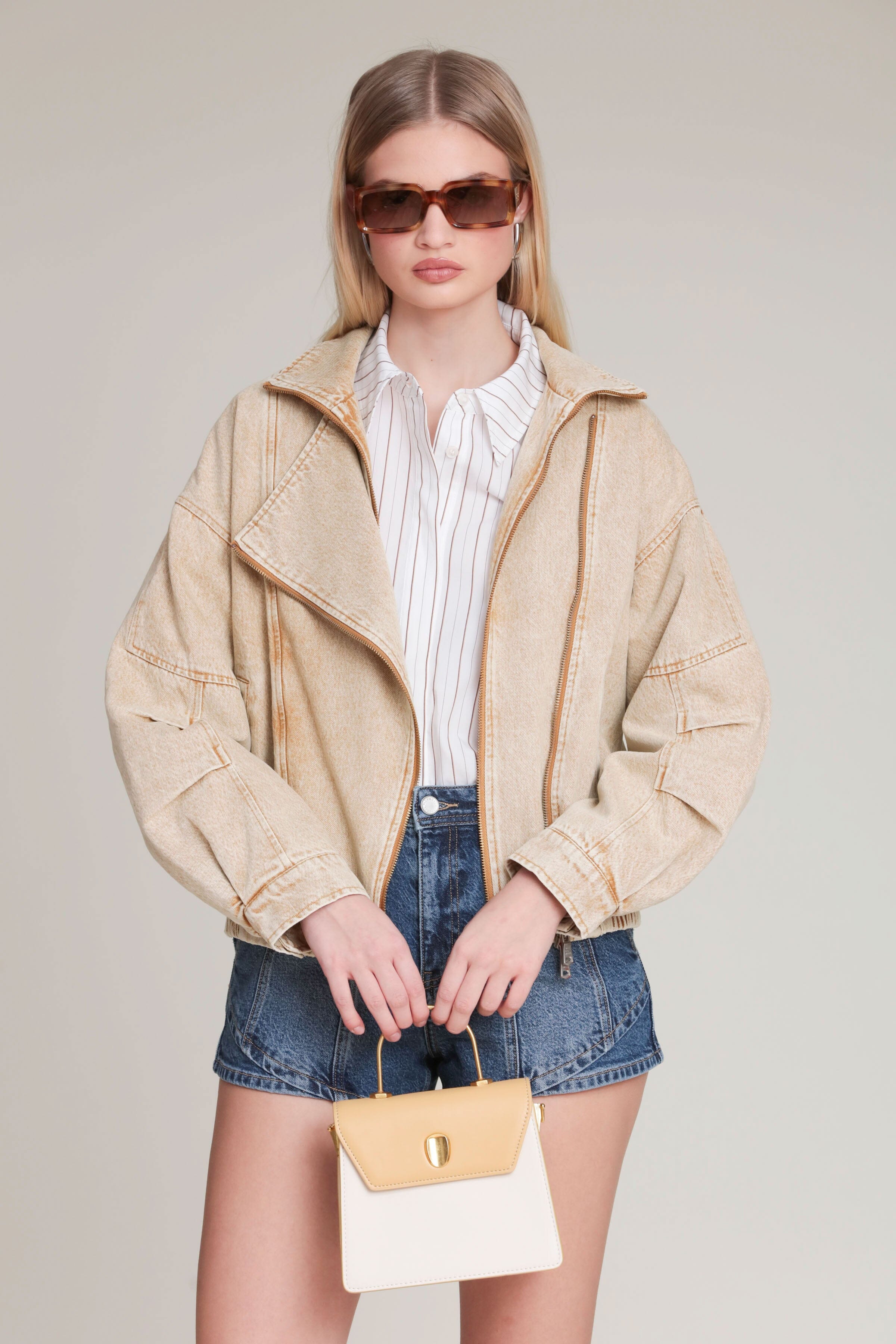 Asymmetric khaki denim bomber jacket in cotton blend with long sleeves and a zip-up front by Avec Les Filles