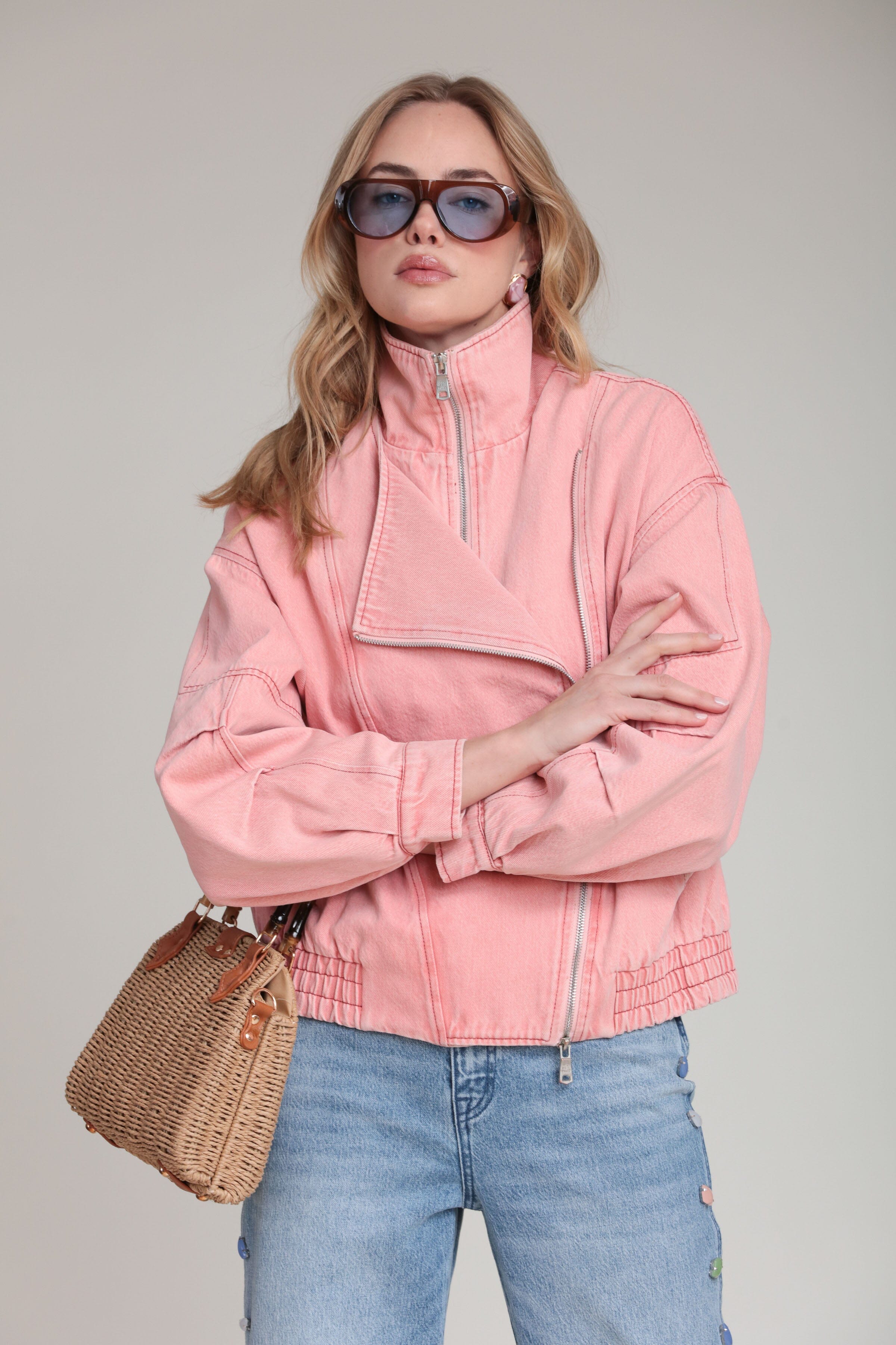 Asymmetric pink denim bomber jacket in cotton blend with long sleeves and a zip-up front by Avec Les Filles