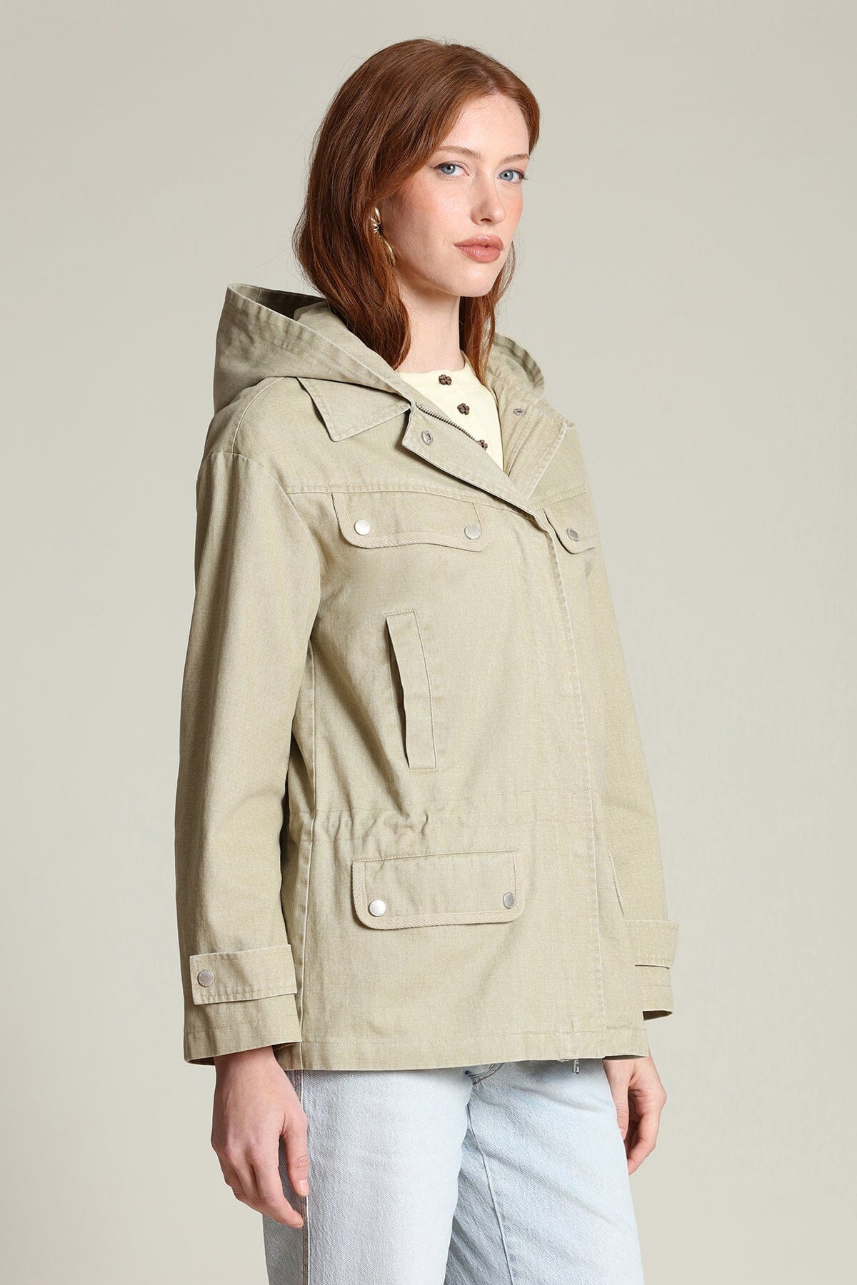 Cotton snap-front beige anorak jacket with long sleeves, attached hood and an adjustable drawstring waist - Shop designer jackets by Avec Les Filles