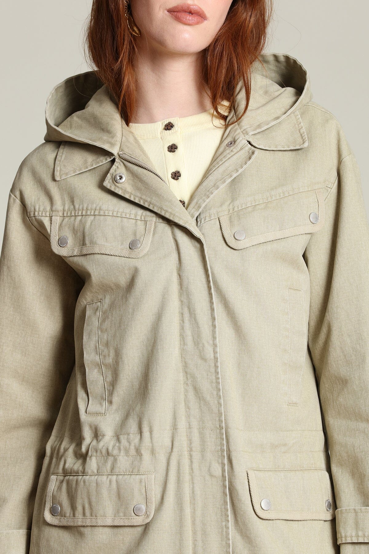 Cotton snap-front beige anorak jacket with long sleeves, attached hood and an adjustable drawstring waist - Shop designer jackets by Avec Les Filles