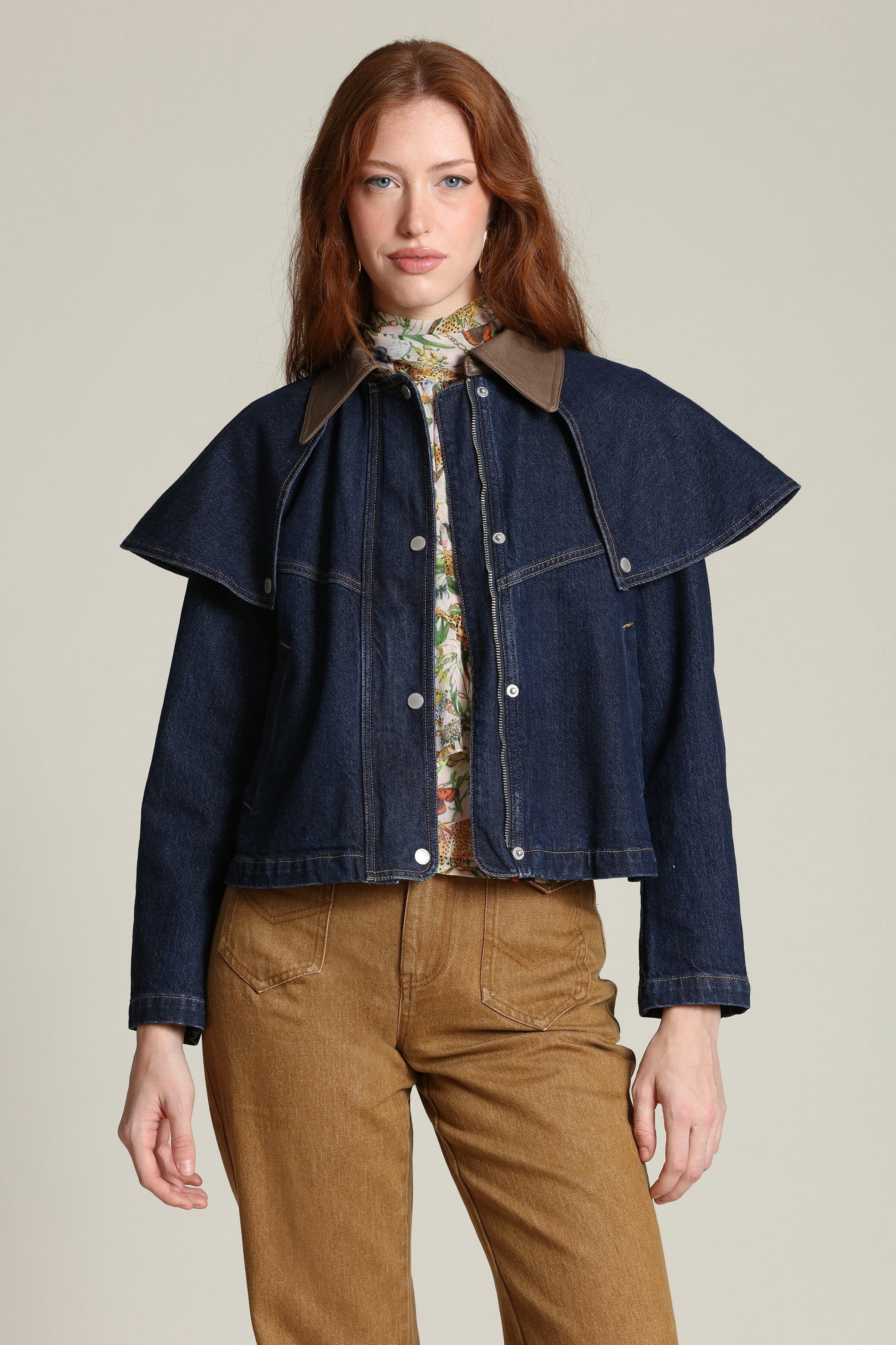 Denim cape cropped indigo blue jacket with snap-front and faux leather contrast collar by Avec Les Filles