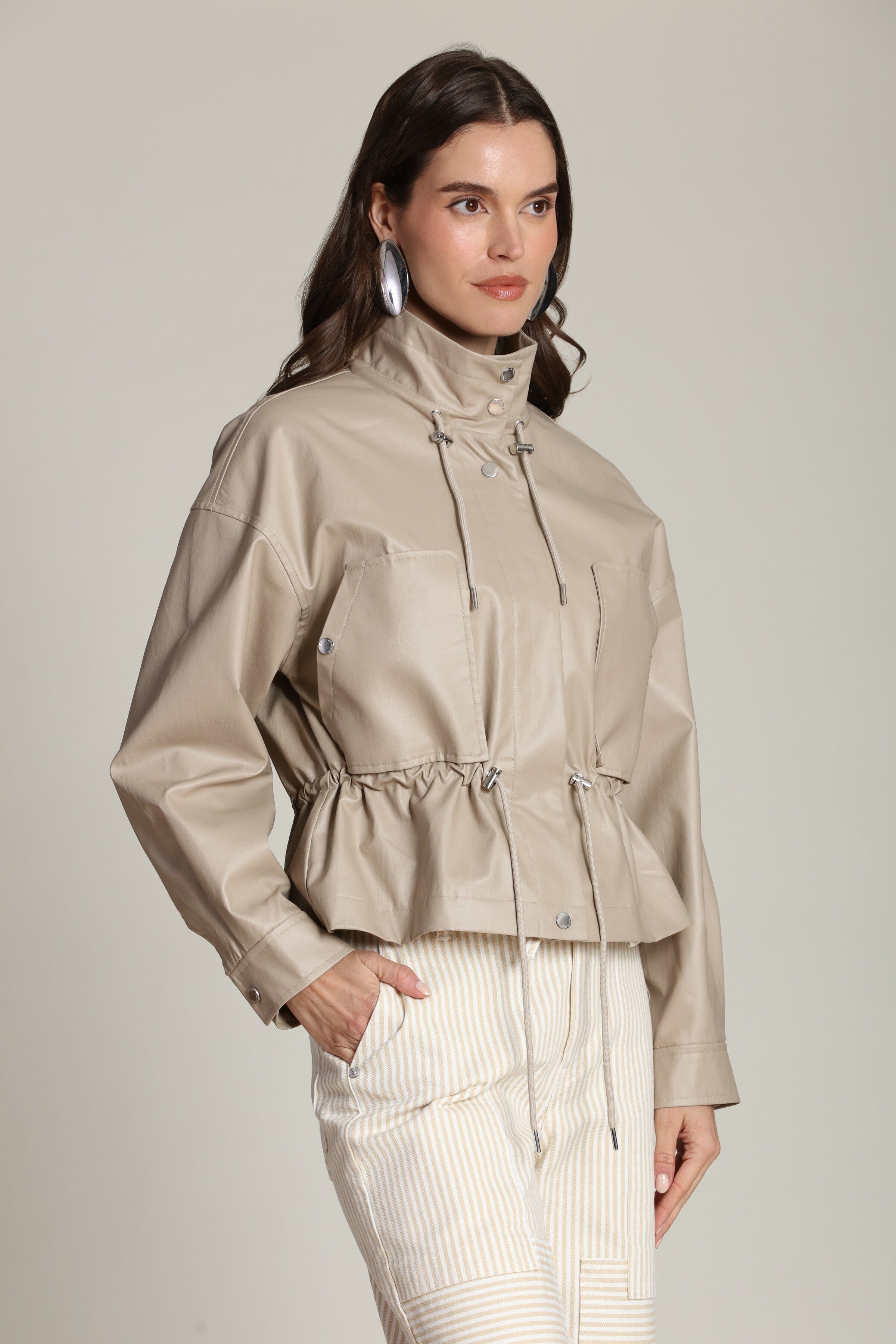 Faux leather cropped beige anorak jacket with snap-button front and adjustable drawstring waist - Women's coats & jackets by Avec Les Filles