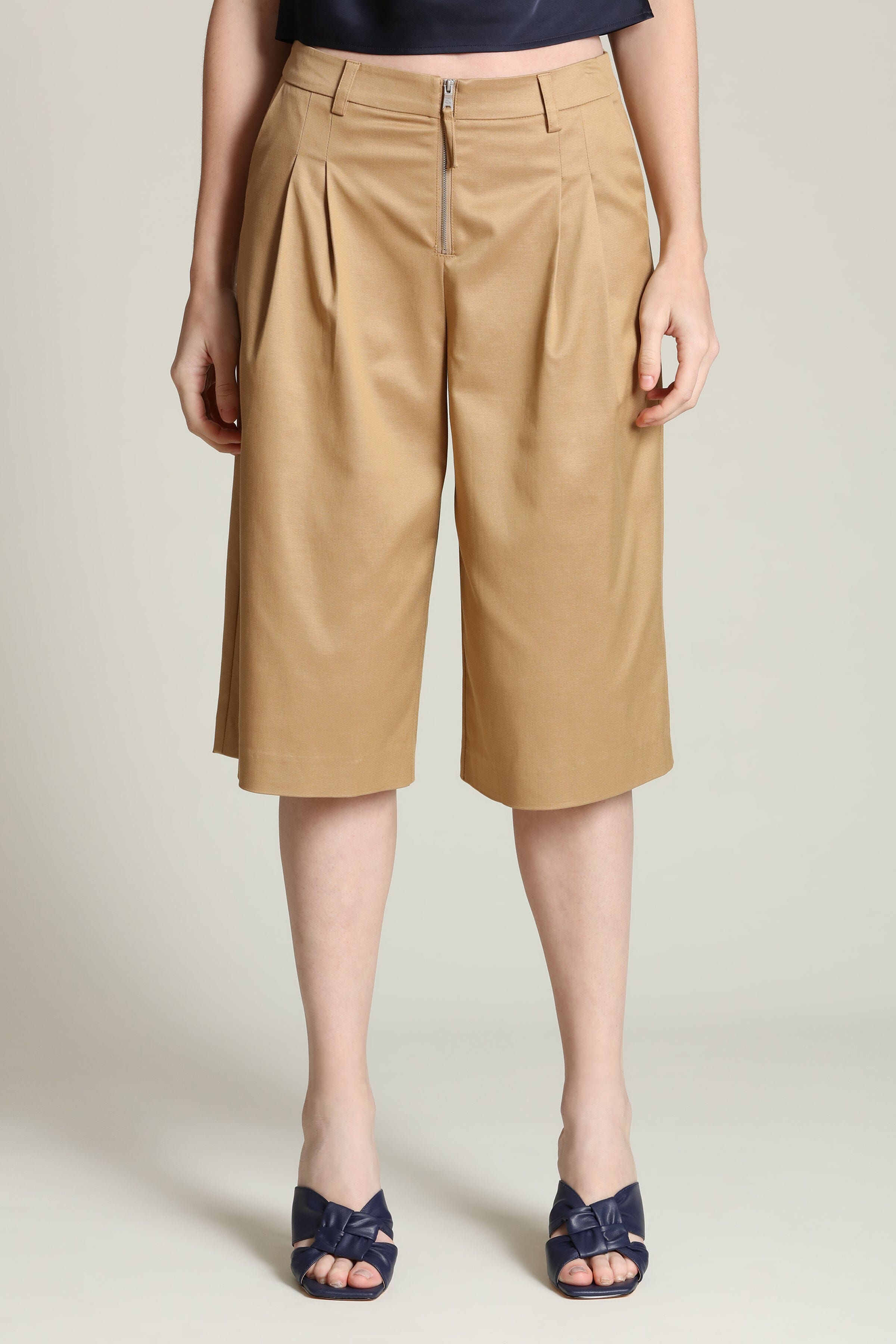 Zip-front tailored beige bermuda short with front pleats, a mid-rise waist, and a wide-leg fit - Cute designer women's bermuda shorts by Avec Les Filles