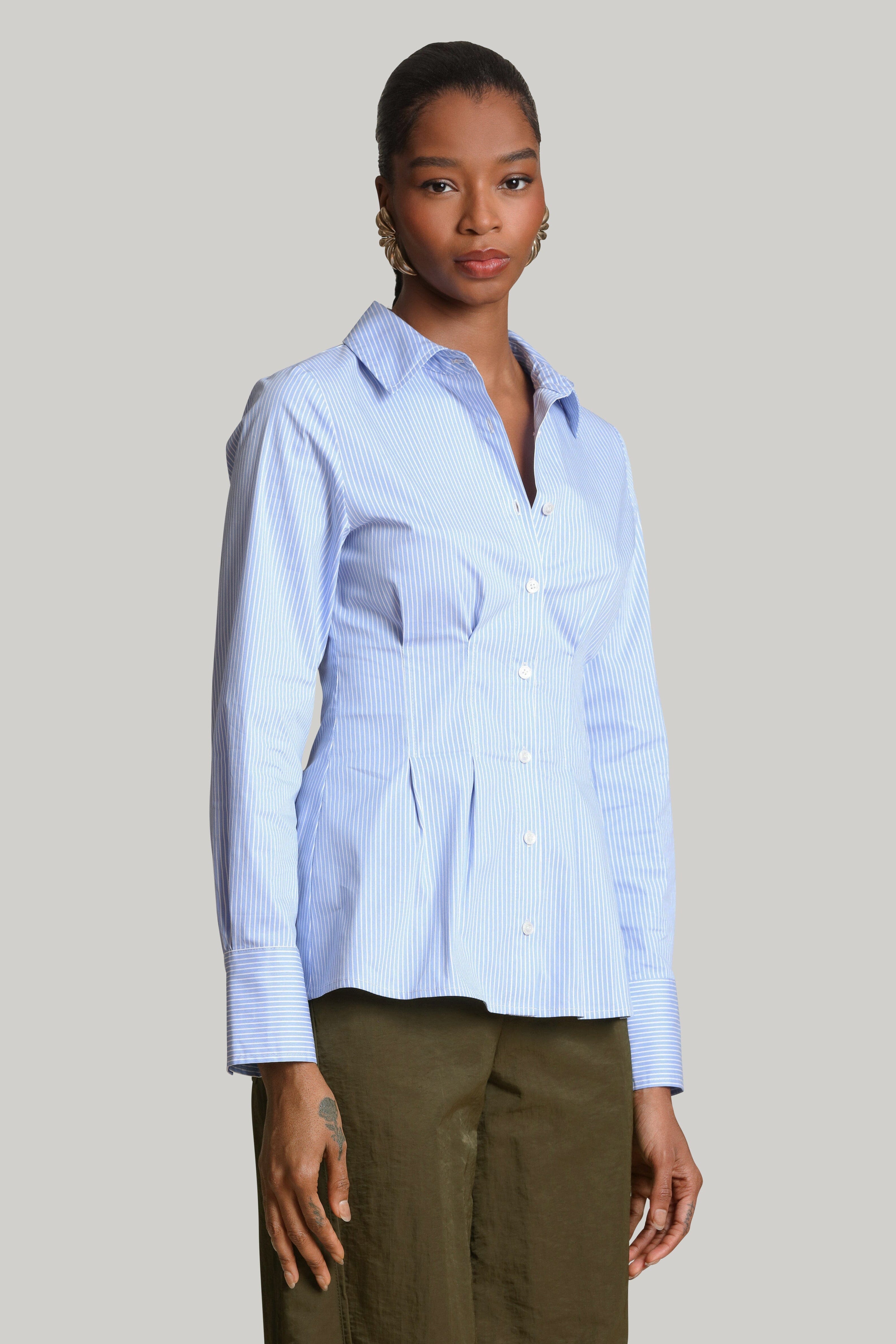 Cinch waist blue white cotton pinstripe shirt with a button-front and point collar by Avec Les Filles