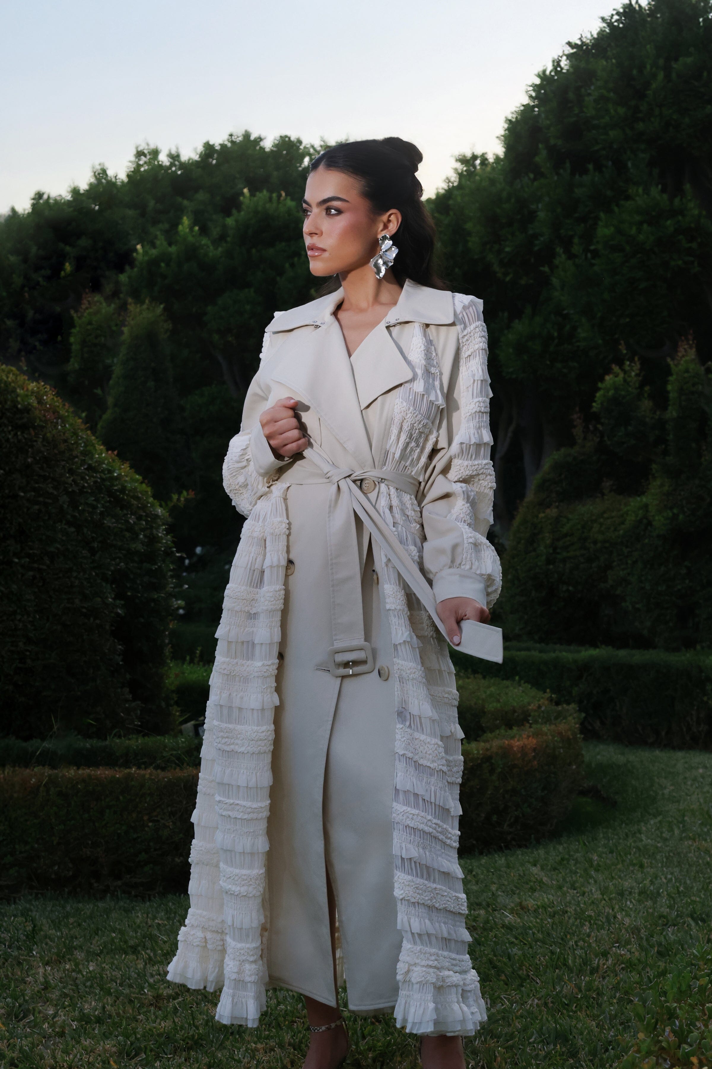 Mixed media double-breasted off-white trench coat with a removable self-tie belt and a chiffon ruffle panelling by Avec Les Filles
