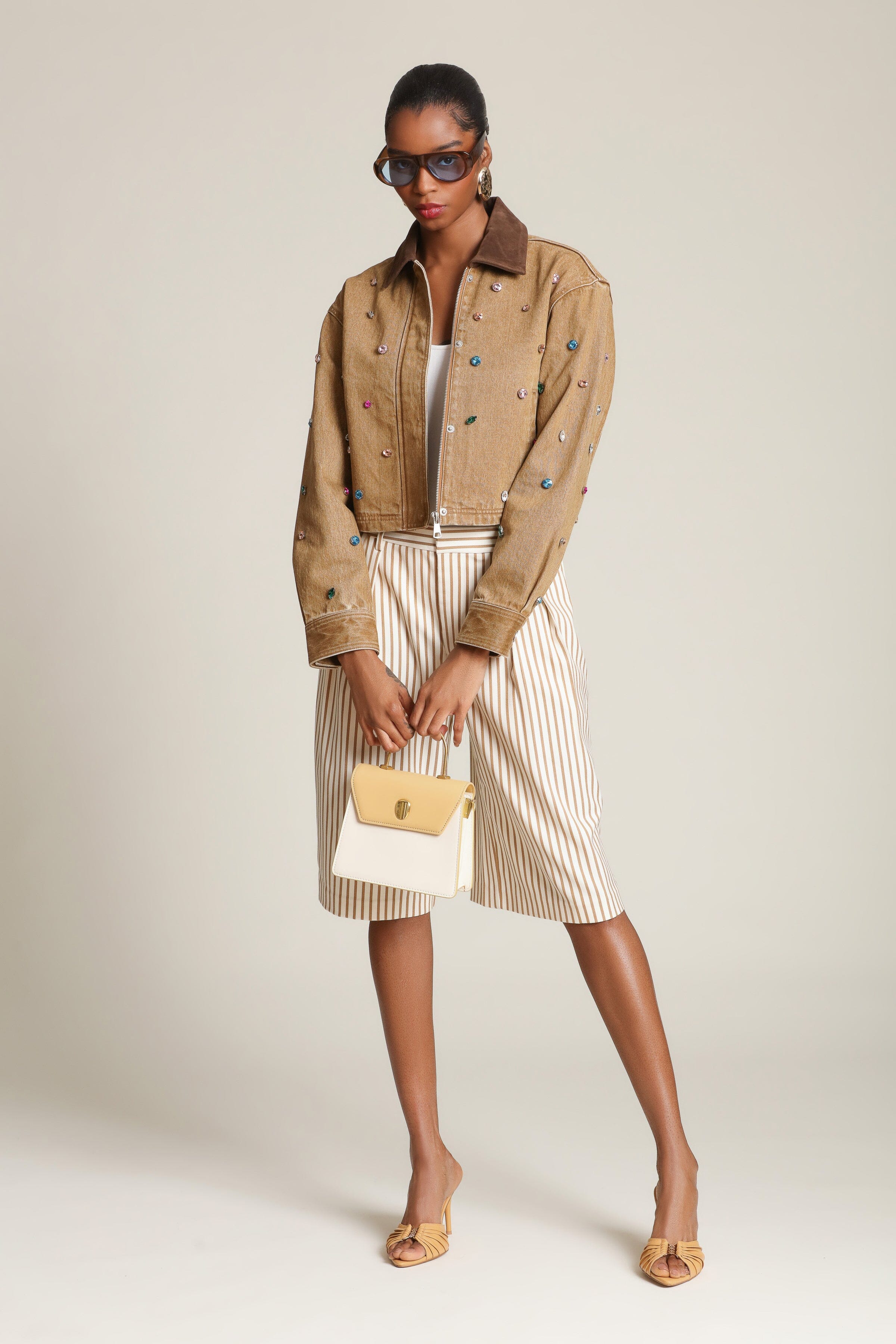 Striped boyfriend camel bermuda shorts with a high-rise waist, front pleats, and faux welt pockets - Shop designer women’s bermuda shorts by Avec Les Filles