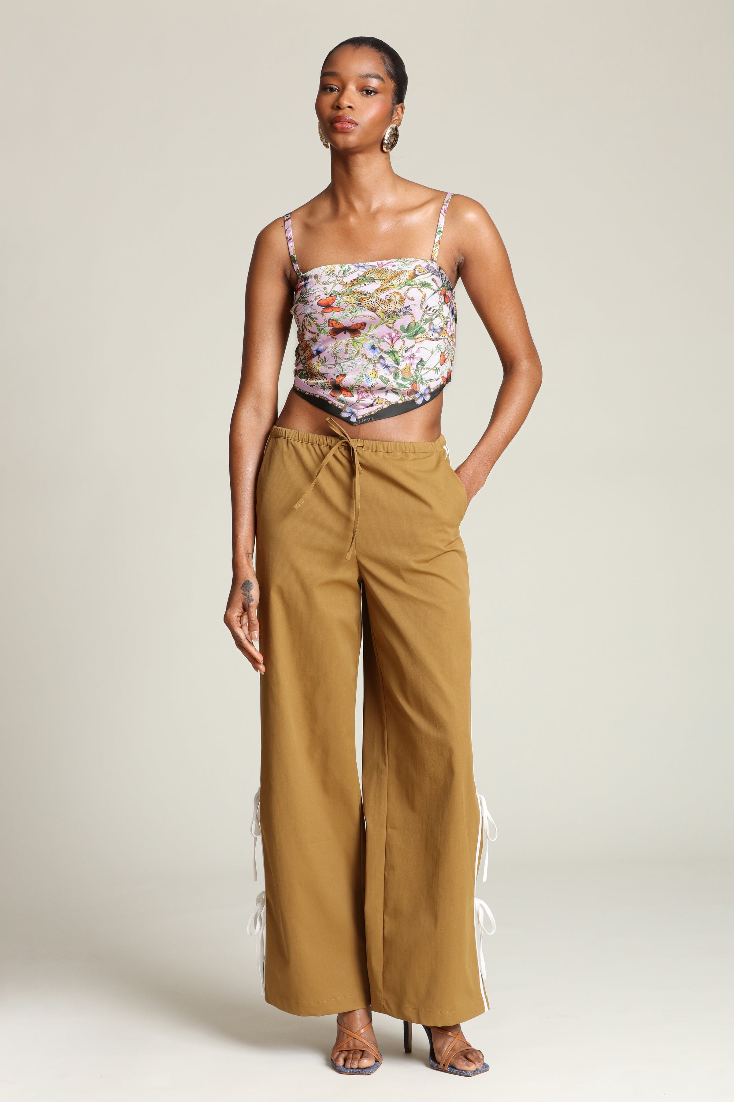 Botanical satin pink cheetah scarf crop top with detachable, adjustable spaghetti straps and brown trouser pant by Avec Les Filles