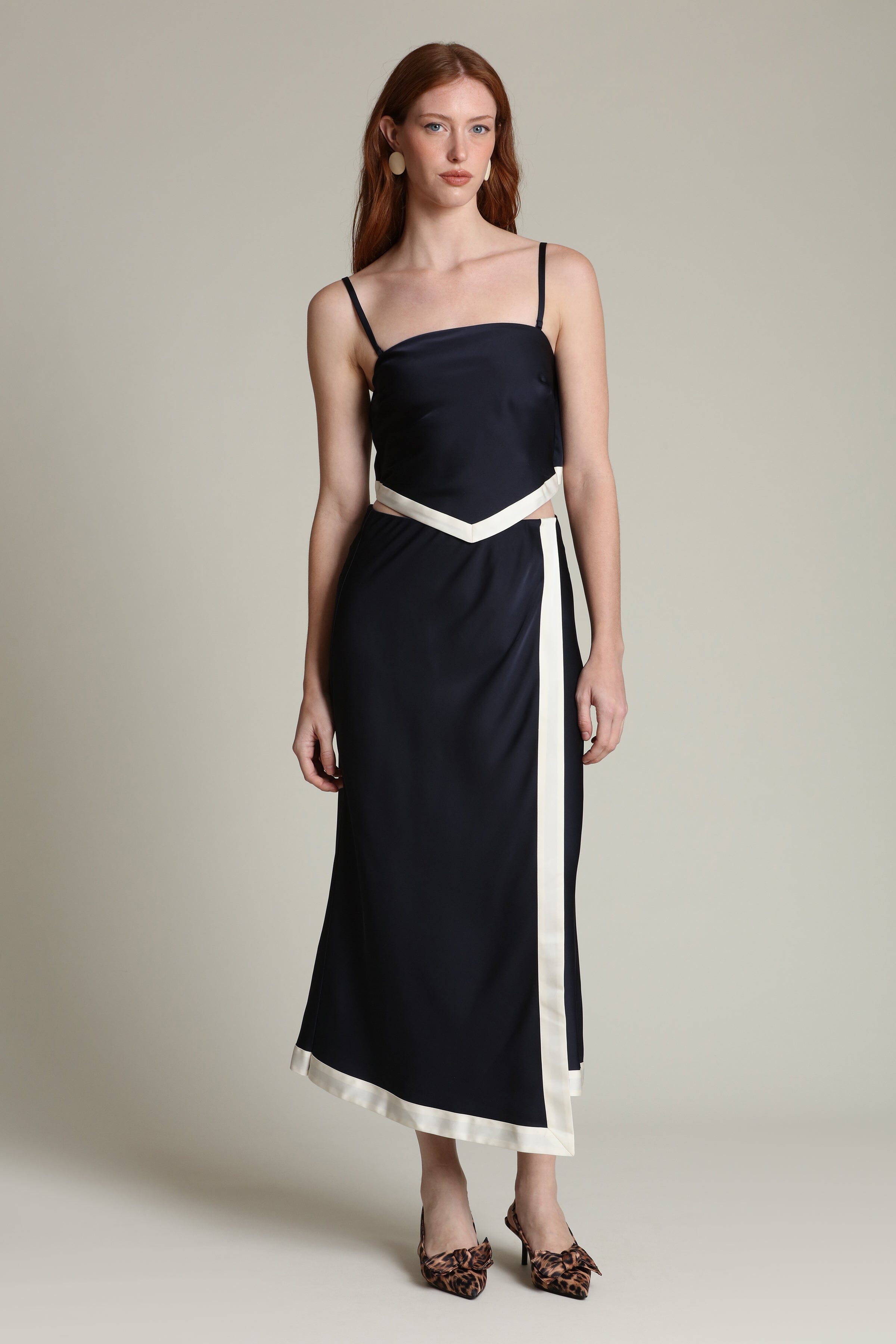 Satin navy off-white scarf crop top with detachable, adjustable spaghetti straps and wrap maxi slip skirt by Avec Les Filles