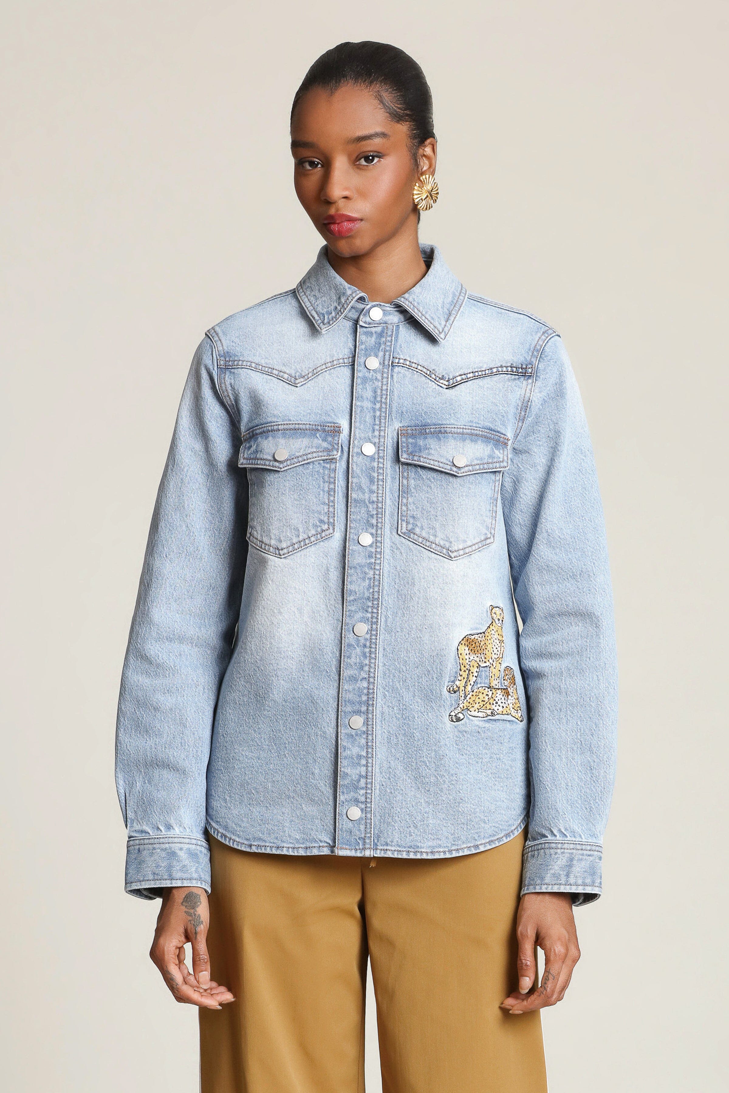 Cheetah patch snap-front blue denim shirt in cotton blend with long sleeves and western yoke detailing - Shop designer women's shirts by Avec Les Filles