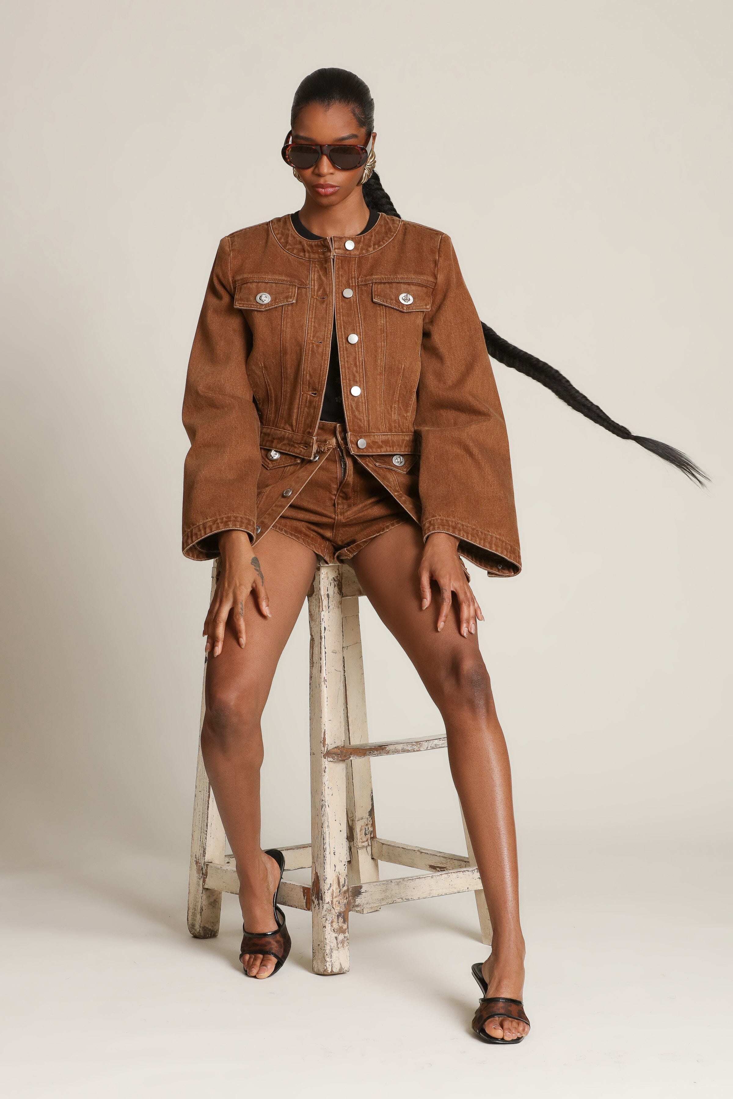 Denim cropped jacket with dramatic sleeves and polished turnlocks- Shop women’s designer coats and jackets by Avec Les Filles