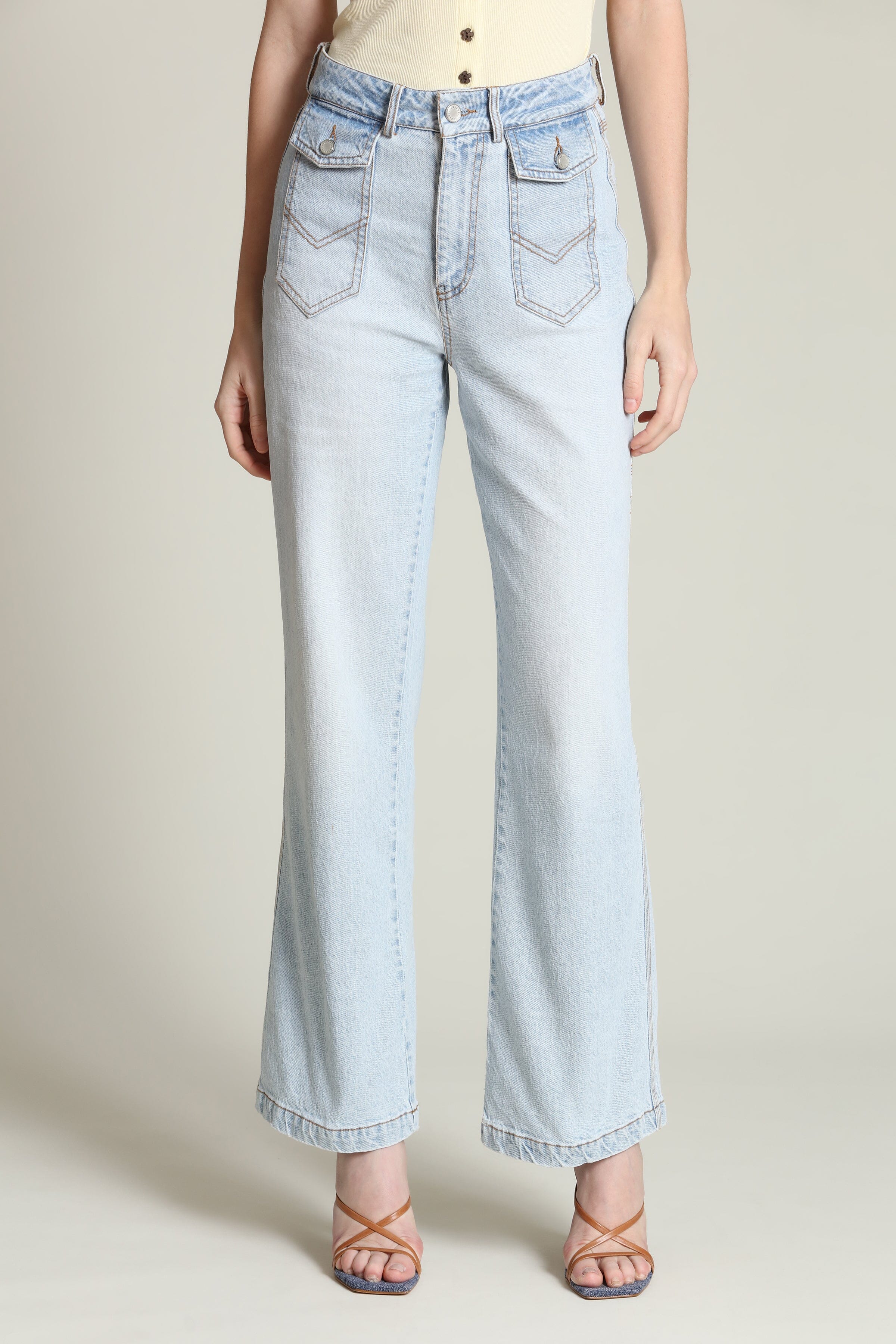 Patch pocket light wash flare jeans in cotton - Shop designer women's high rise flare jeans by Avec Les Filles