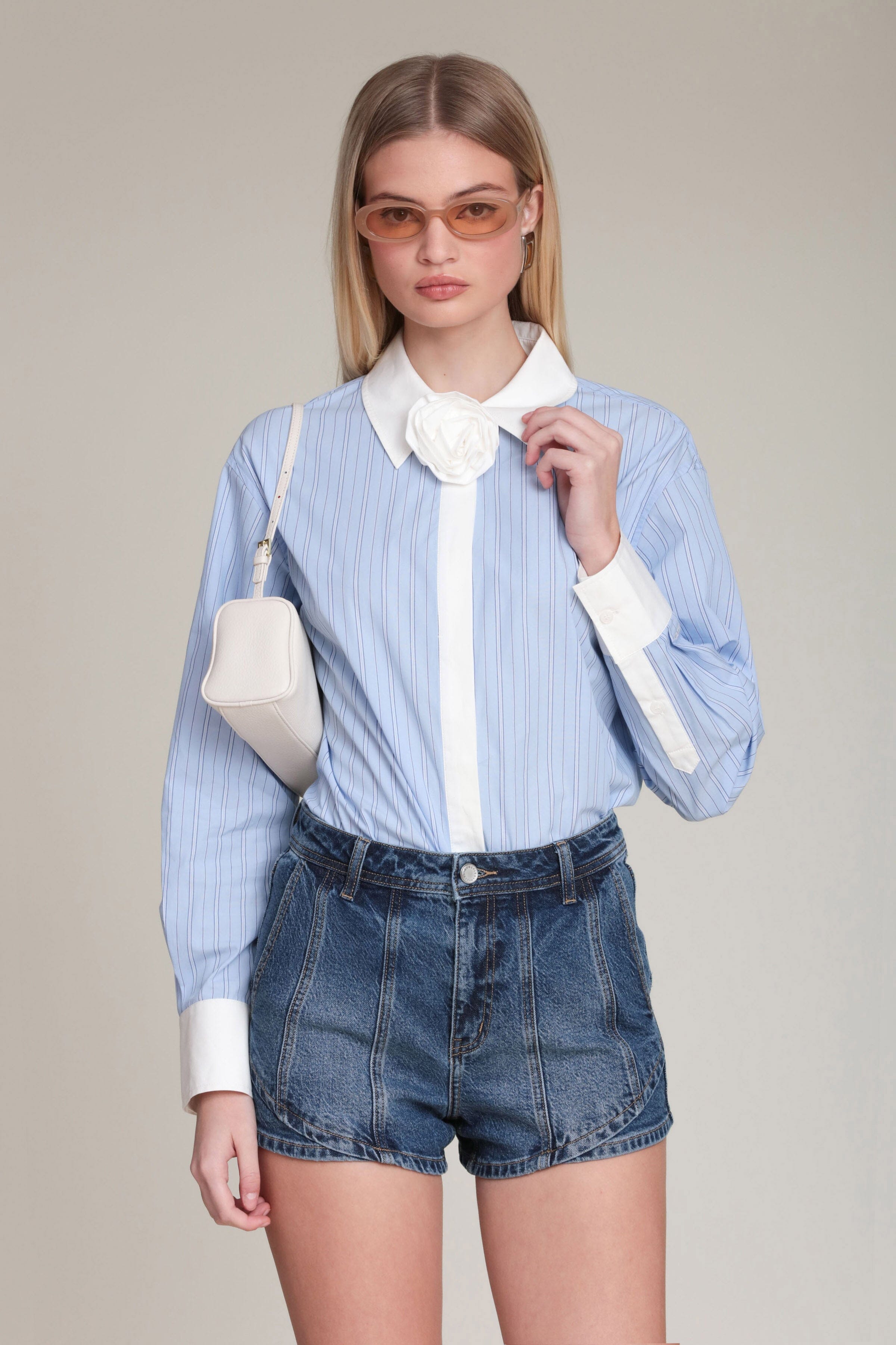 Rosette detail cotton contrast button-down blue & white stripe shirt with a pointed collar and long sleeves - Shop designer women's shirts by Avec Les Filles