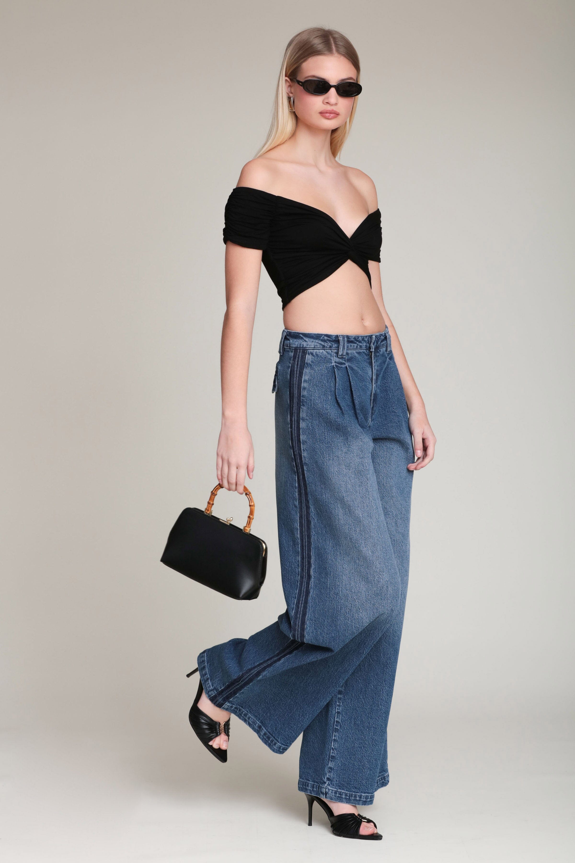 Side stripe wide-leg dark blue wash denim jeans in cotton blend with mid-rise waist and front pleats - Shop women's designer jeans trousers by Avec Les Filles