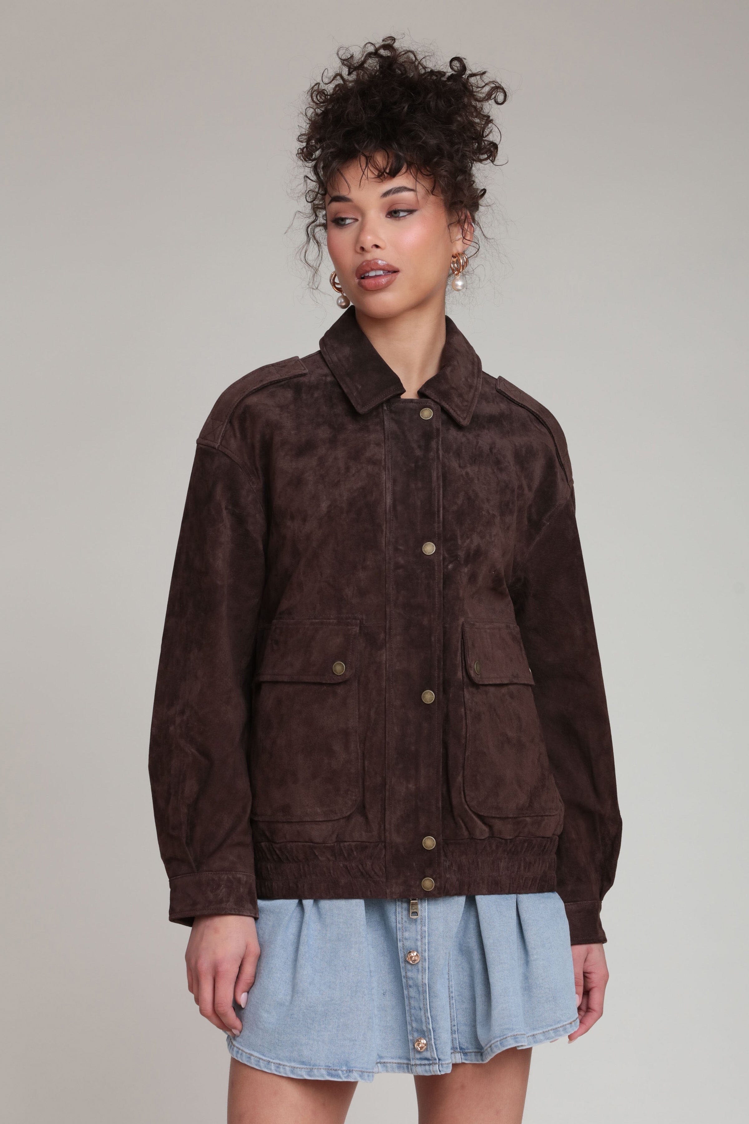 Genuine leather suede relaxed dark brown bomber jacket with a pointed collar and drop-shoulders by Avec Les Filles