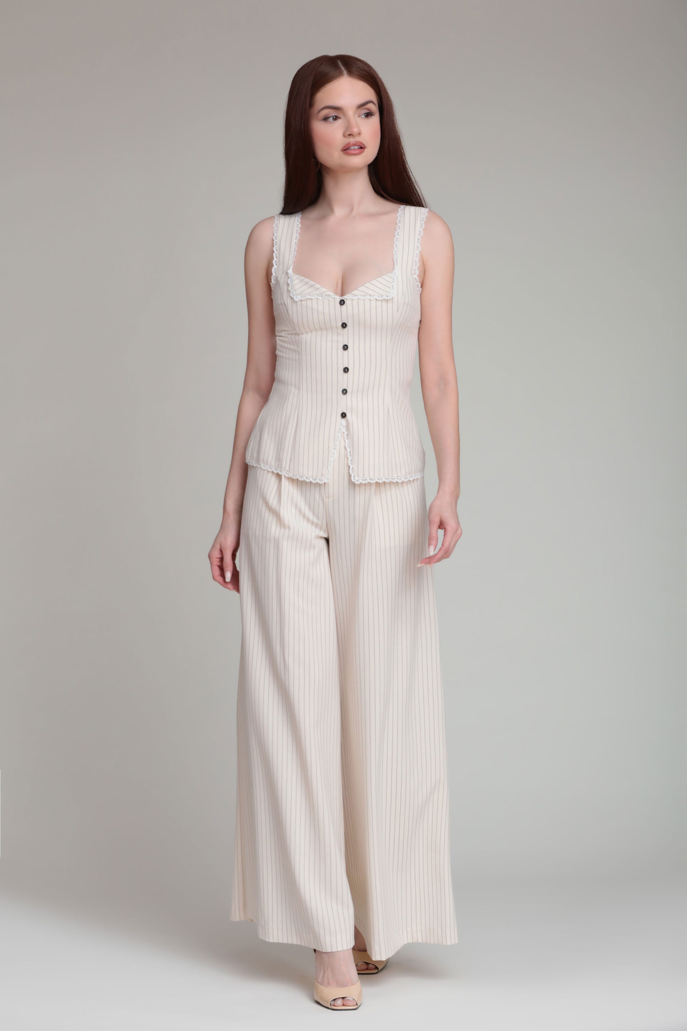 Stripe suiting wide leg pant with high-rise waist and cream and black striped button up tank top by Avec Les Filles