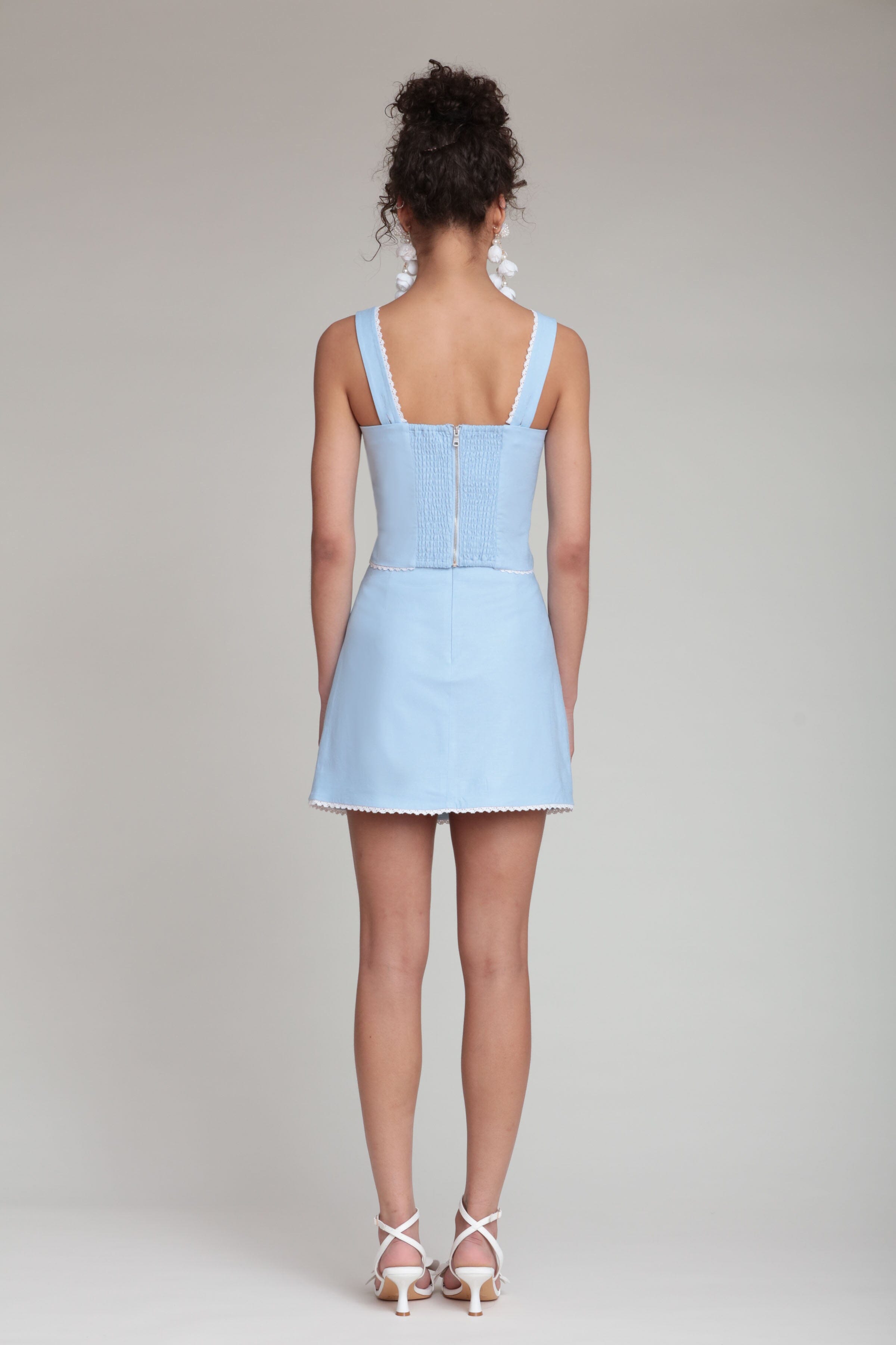Light blue linen corset top with wide shoulder straps and mini skirt - Shop women's cute linen tops by Avec Les Filles