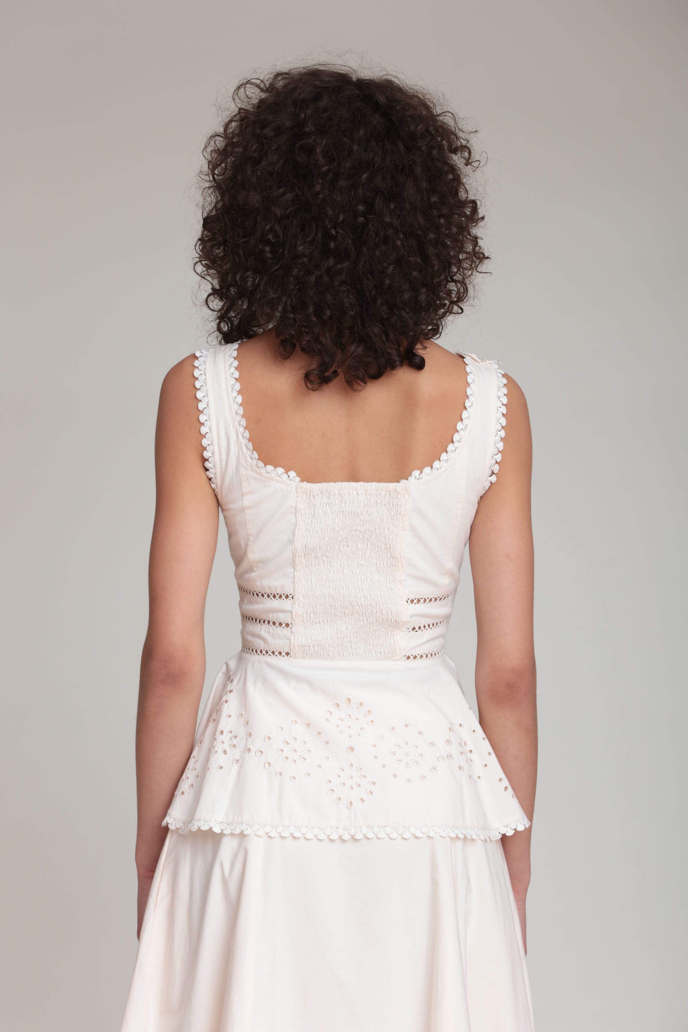 Cotton embroidered cream sleeveless peplum top - Shop cute womens peplum tops by Avec Les Filles