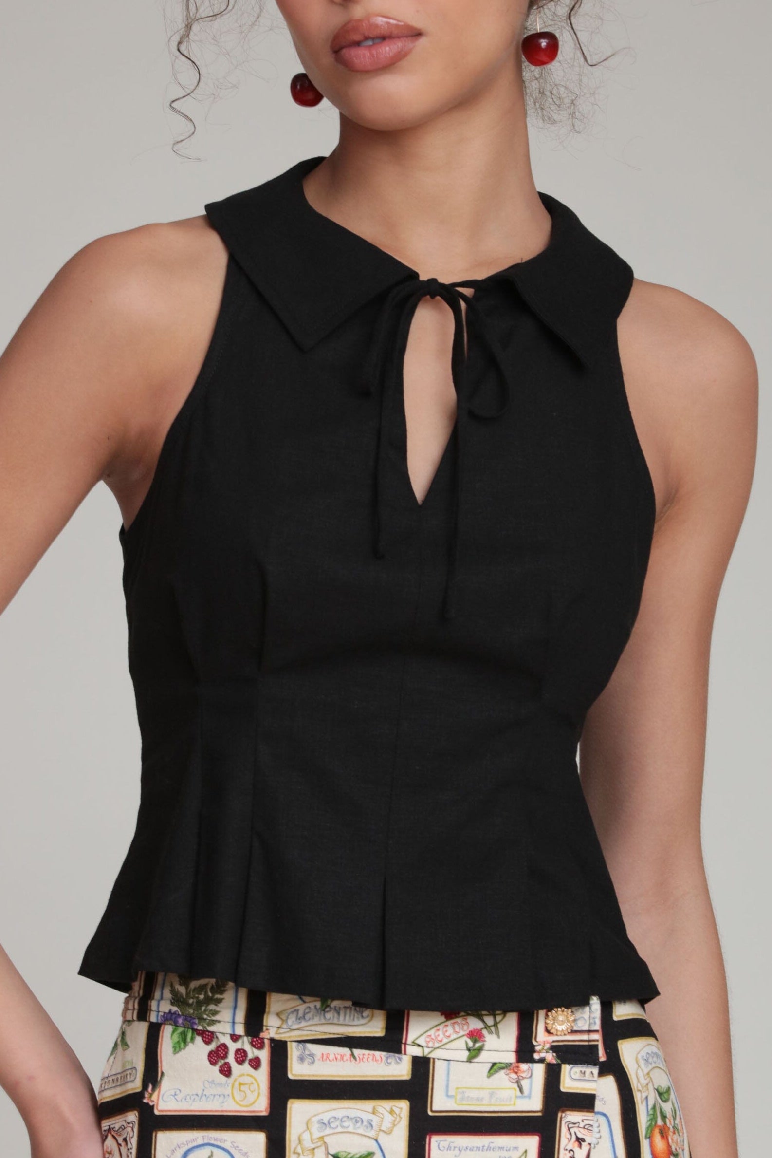 Linen blend sleeveless black women's blouse with a pointed collar and front tie - Shop cute tops by Avec Les Filles