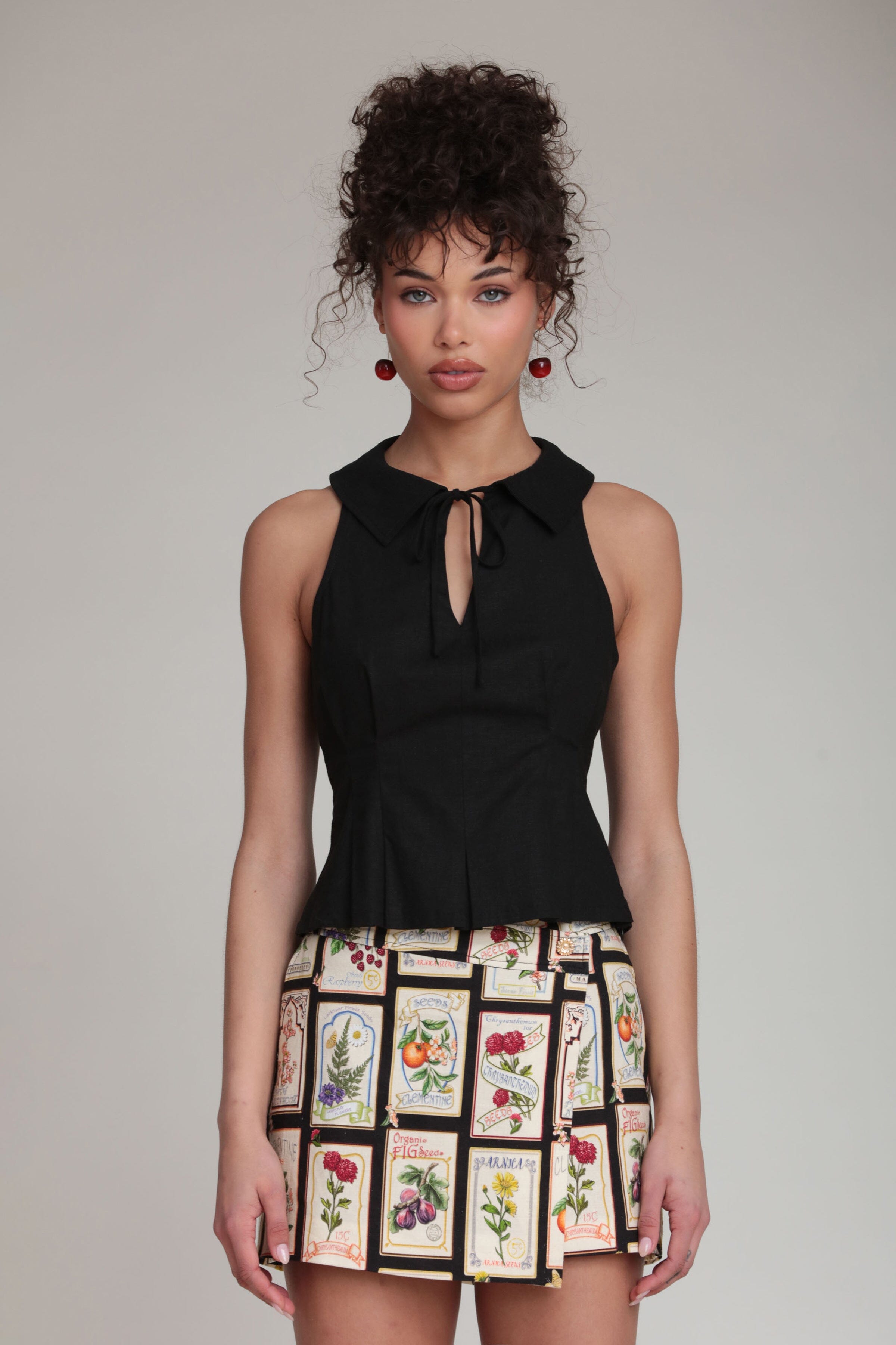 Linen blend sleeveless black top with a pointed collar and front tie - Shop women's cute tops by Avec Les Filles