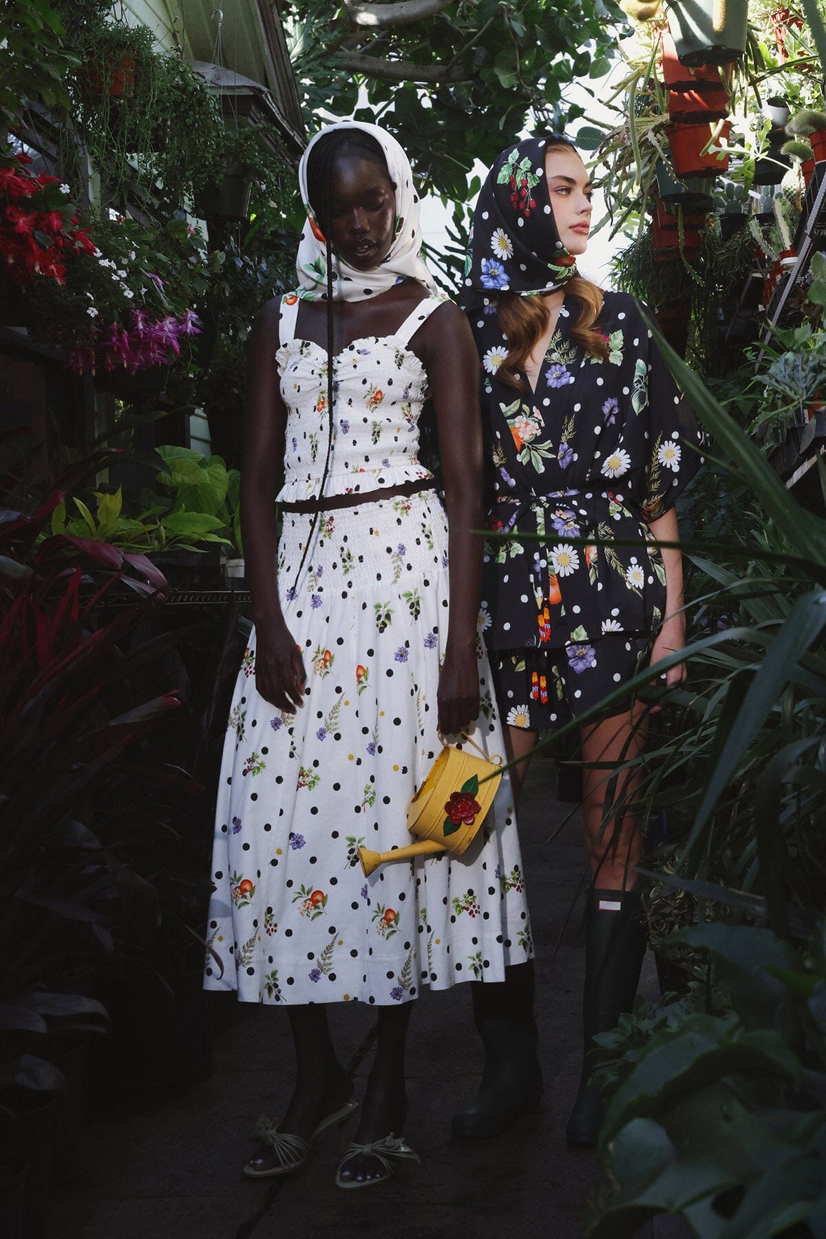 Floral polka dot white smocked midi skirt with black floral shorts and black kimono top by Avec Les Filles
