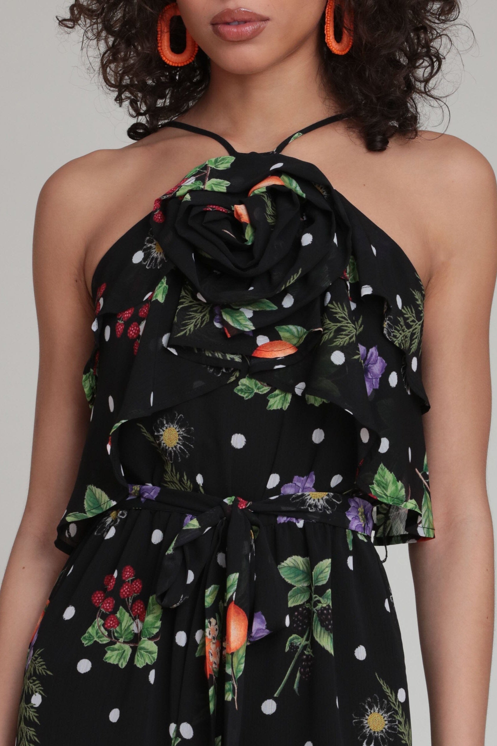 Polka dot chiffon black floral jumpsuit with waist belt and adjustable spaghetti straps by Avec Les Filles