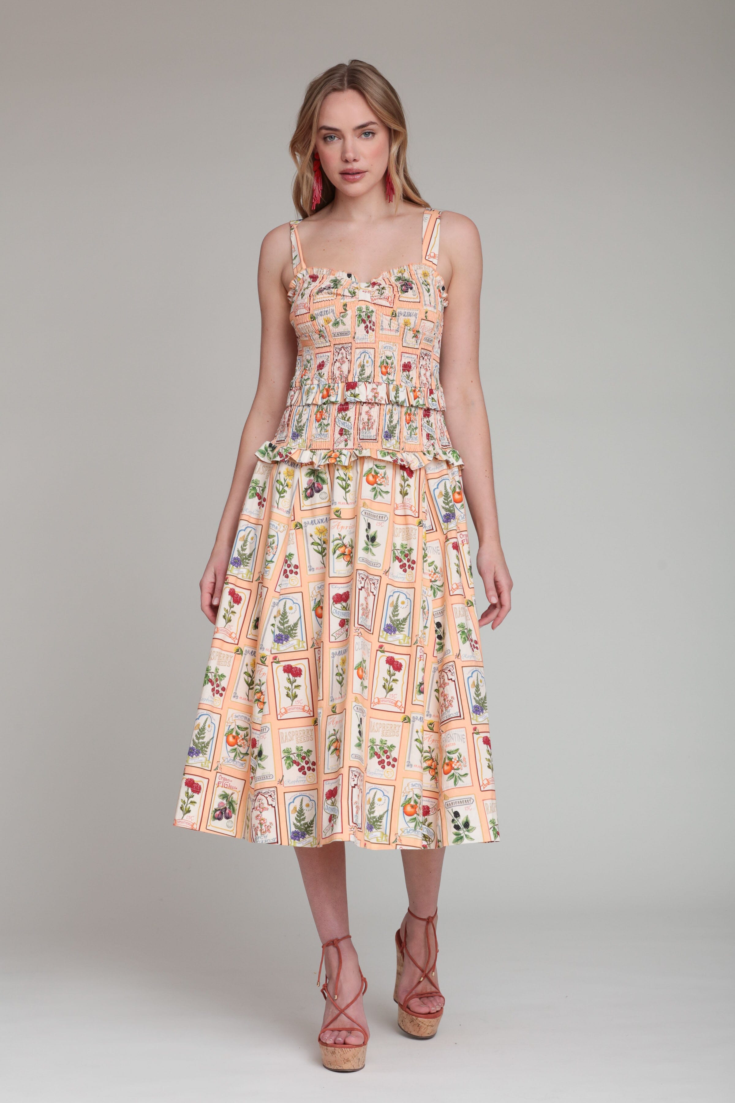 Cotton peach floral midi dress with adjustable shoulder straps and sweetheart neck by Avec Les Filles